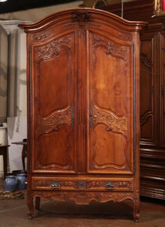 18th Century French Louis XV Carved Cherry Two-Door Armoire from Poitou Region