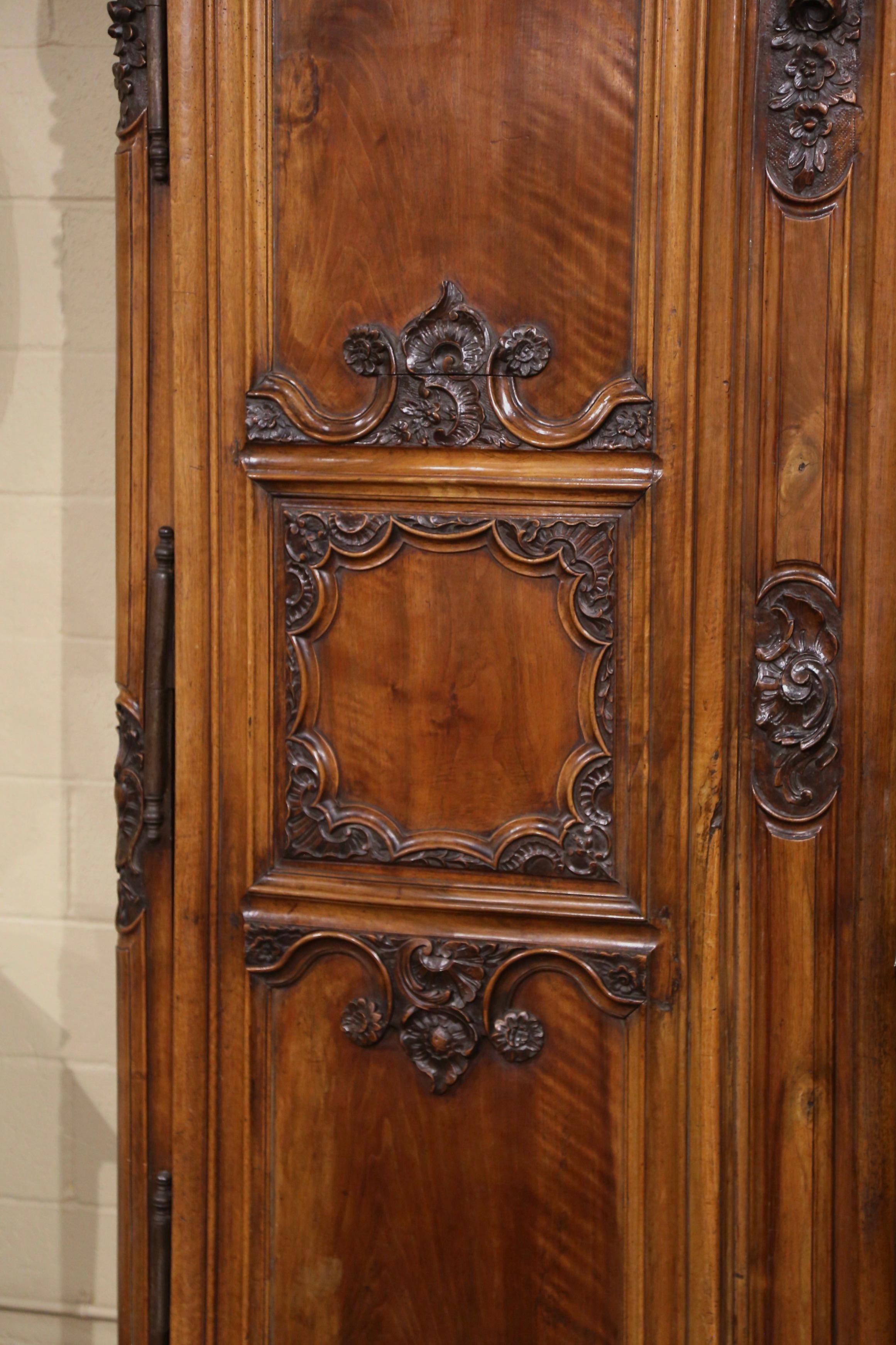 Patinated 18th Century French Louis XV Carved Walnut Armoire from Lyon For Sale