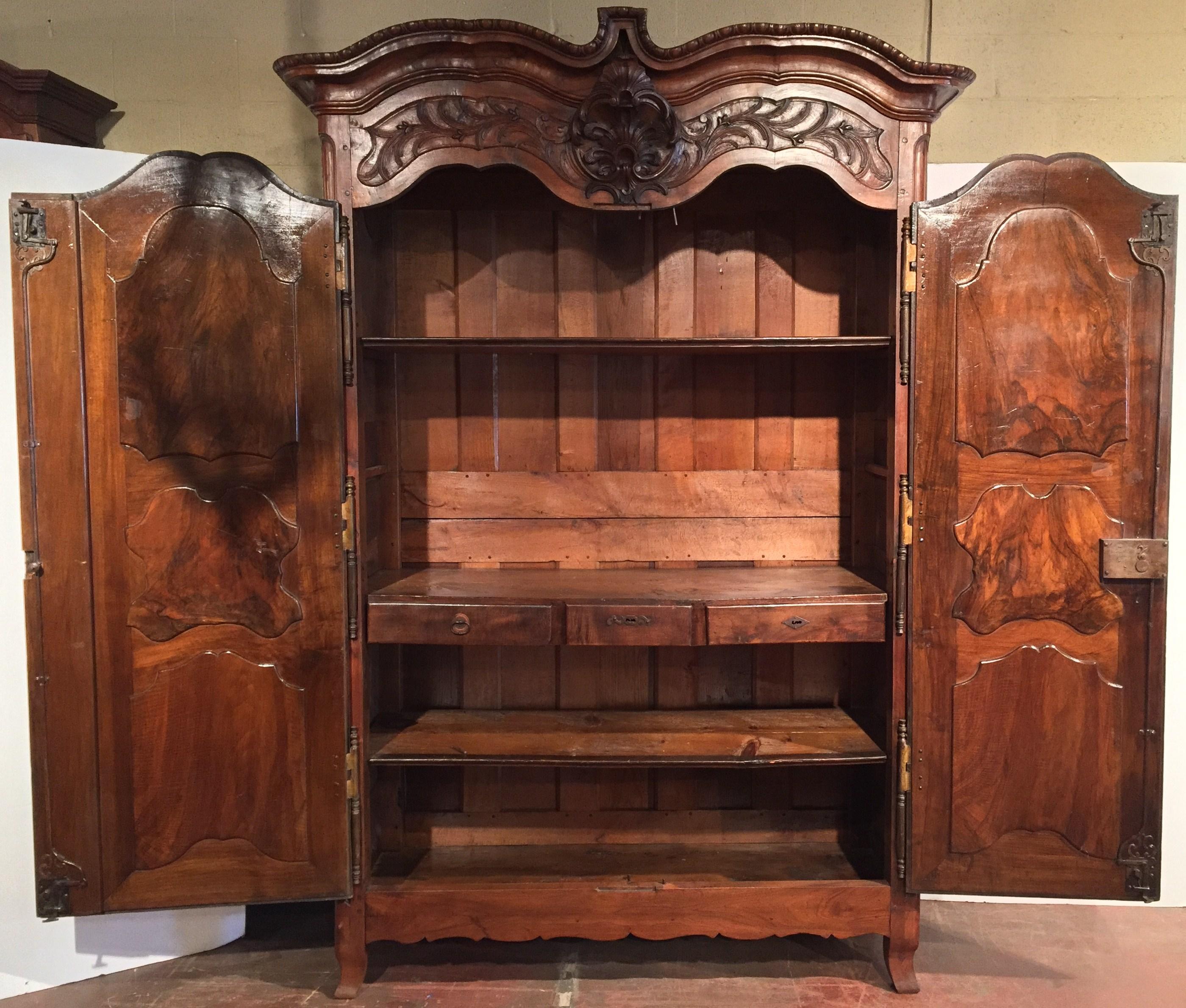 Hand-Carved 18th Century French Louis XV Carved Walnut Armoire from Lyon For Sale