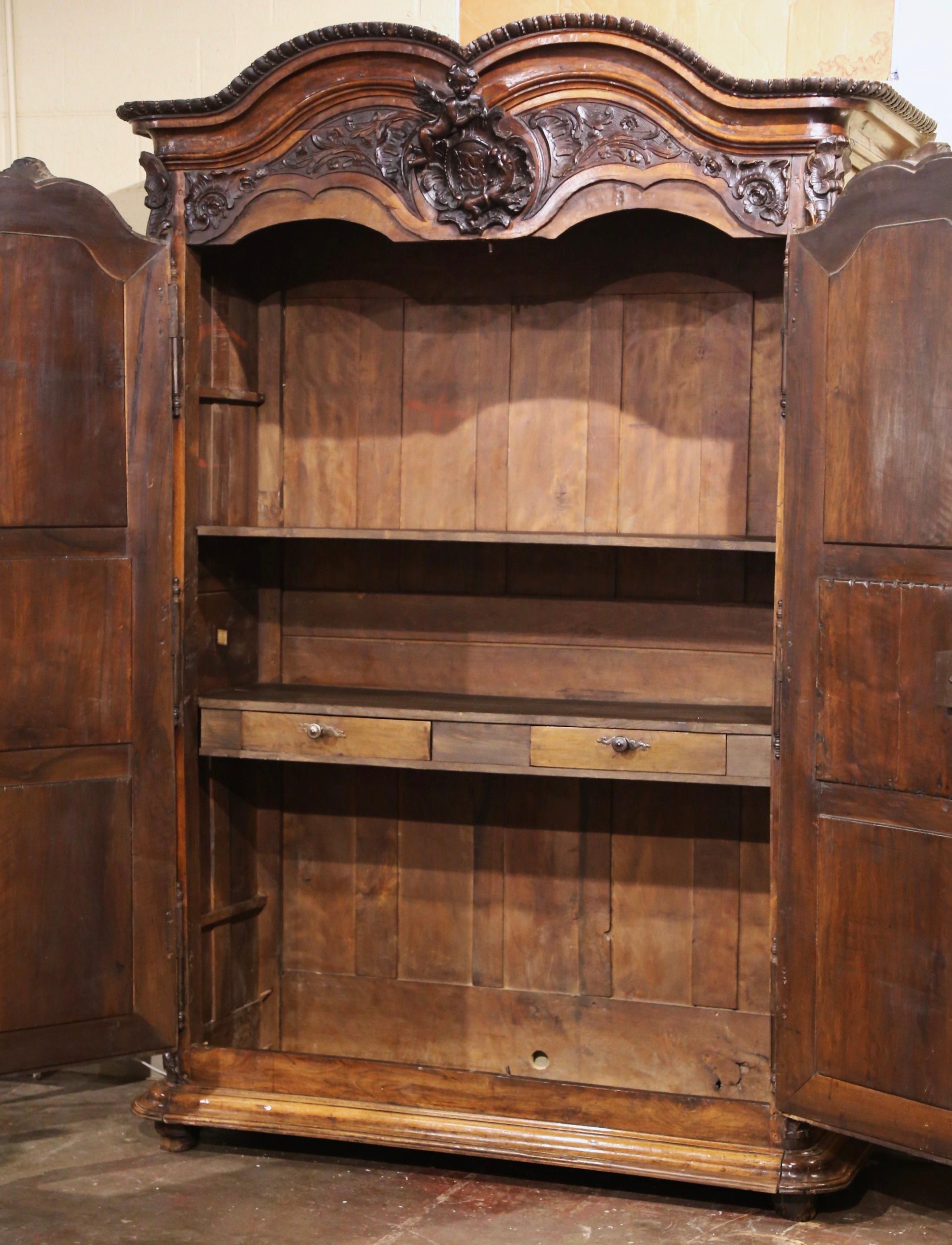 18th Century French Louis XV Carved Walnut Armoire from Lyon In Excellent Condition For Sale In Dallas, TX