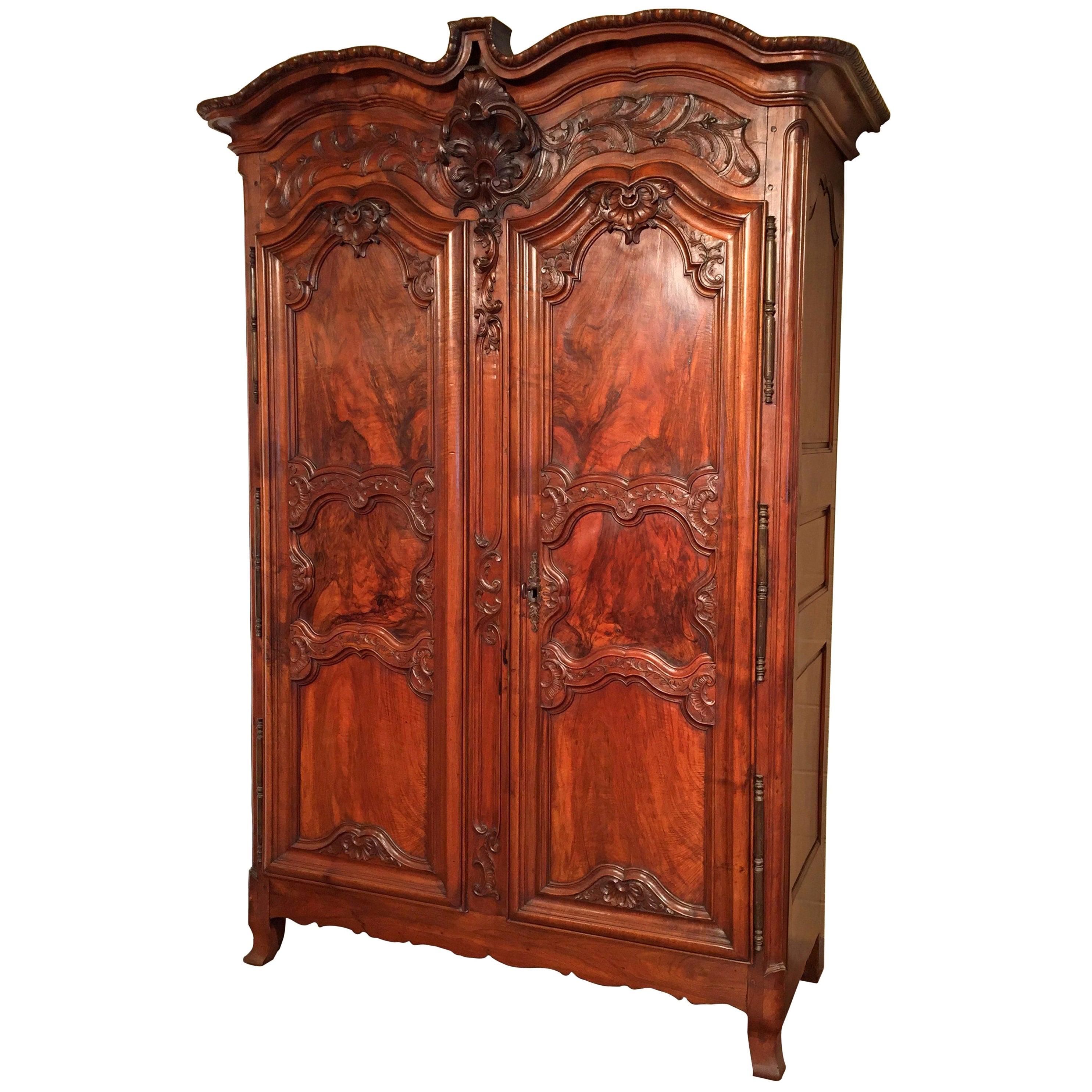 18th Century French Louis XV Carved Walnut Armoire from Lyon