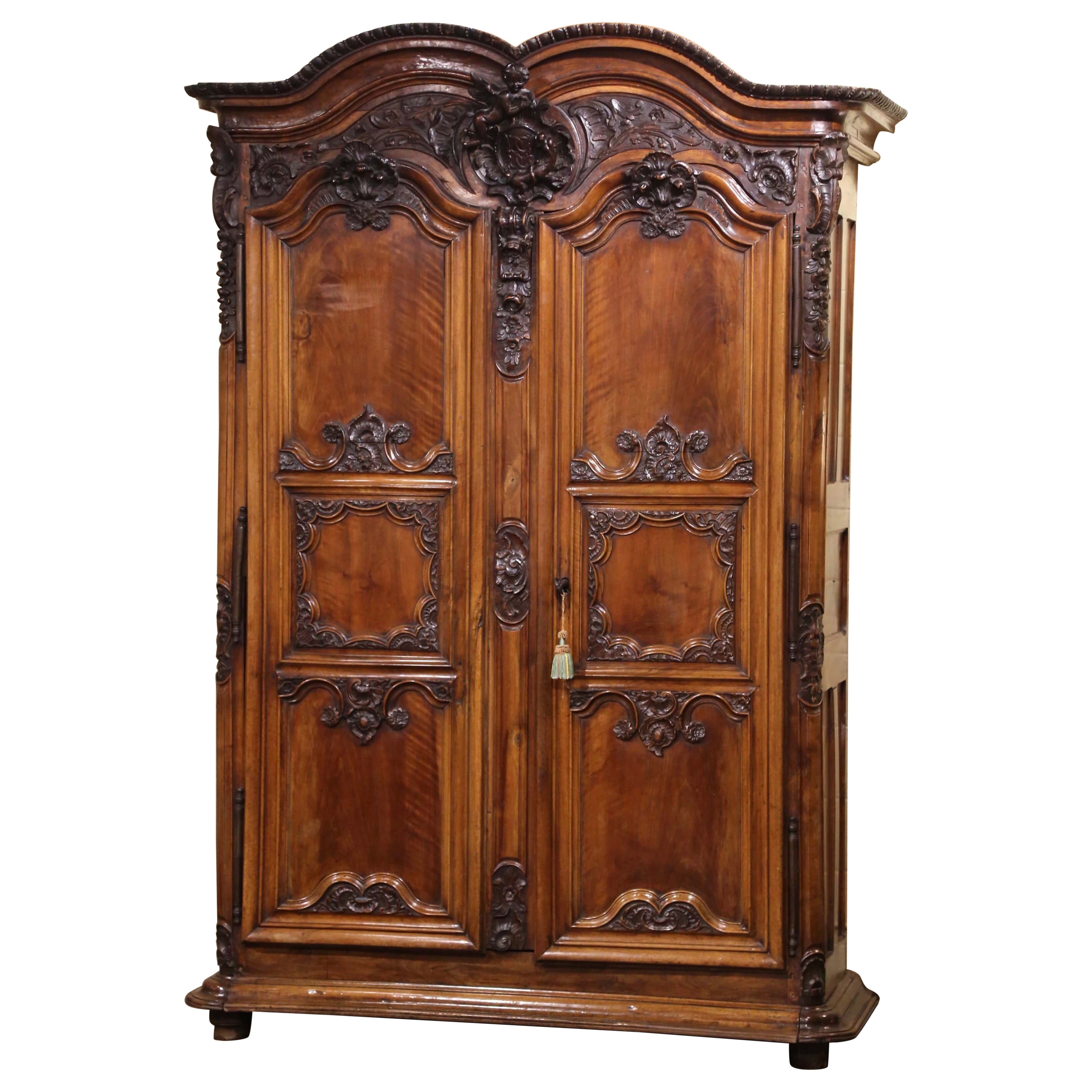 18th Century French Louis XV Carved Walnut Armoire from Lyon