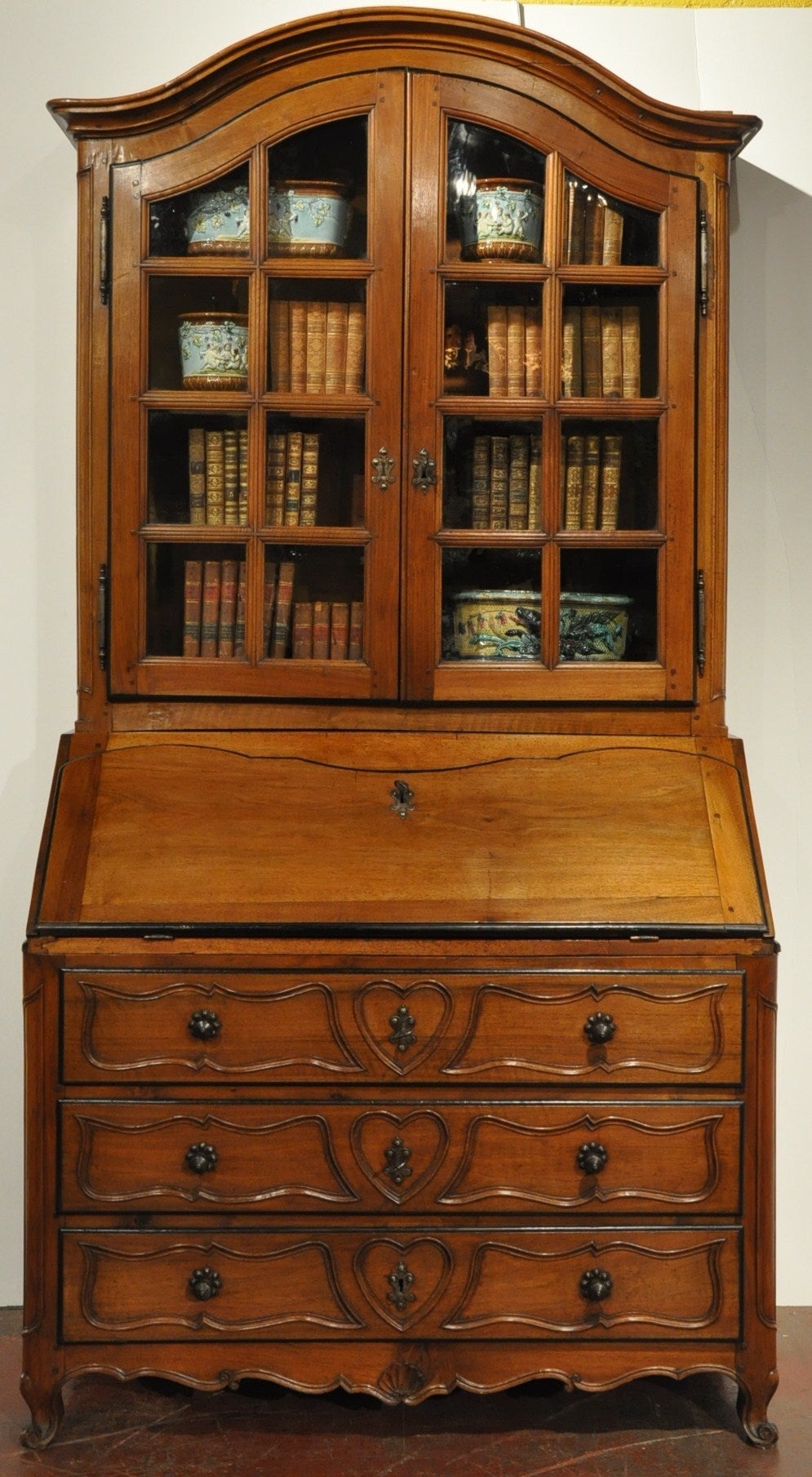 Useful and beautiful, this elegant antique fruitwood 