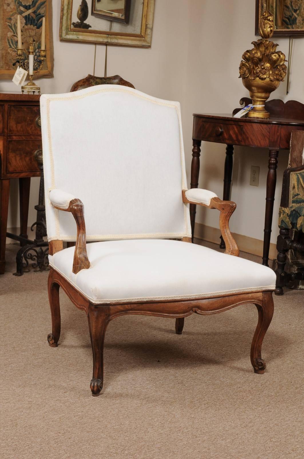 Louis XV Period walnut fauteuil / open arm chair on cabriole legs, France, ca. 1740-60.