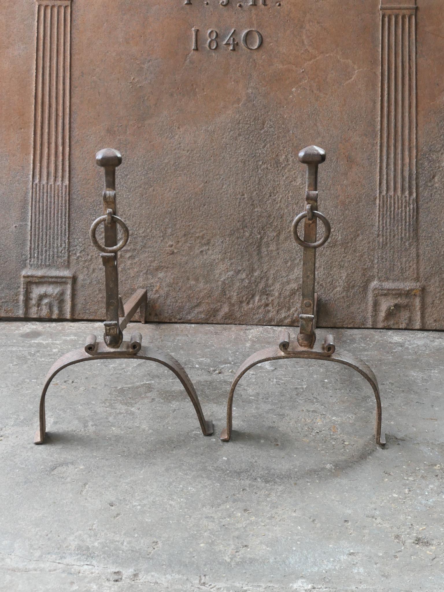 18th Century French Louis XV period andirons. Made of wrought iron.  The andirons are in a good condition and are fully functional. 