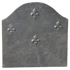 Plaque de cheminée Louis XV du 18ème siècle avec fleurs de lys