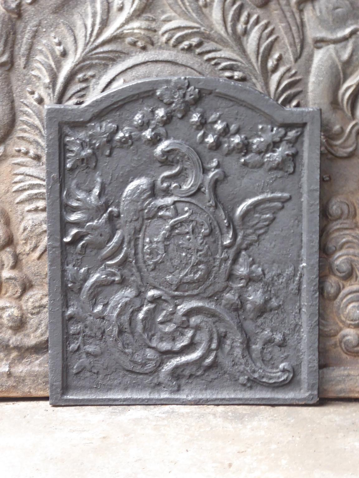 18th century French Louis XV fireback with a typical Louis XV decoration.

The fireback is made of cast iron and has black / pewter patina. The fireback is in a good condition and does not have cracks.







  
