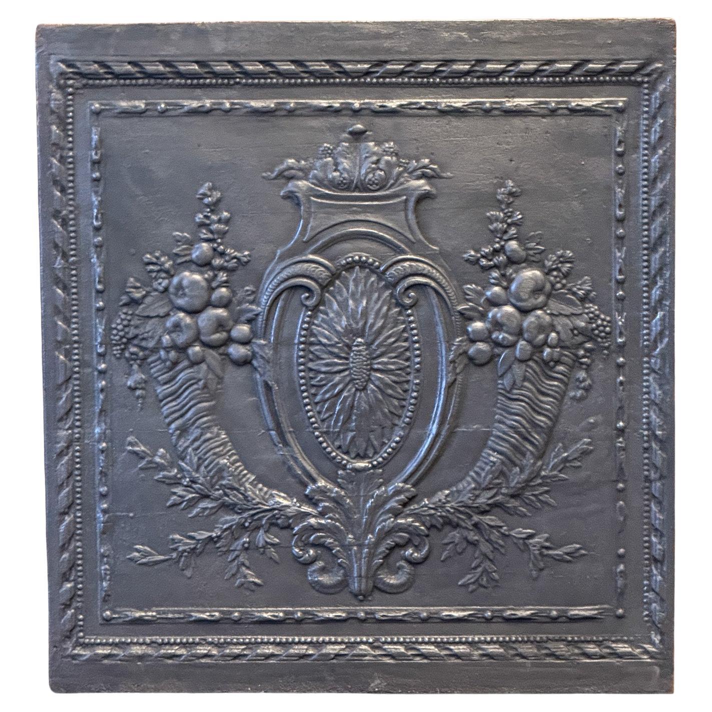 What is a fireplace back plate?