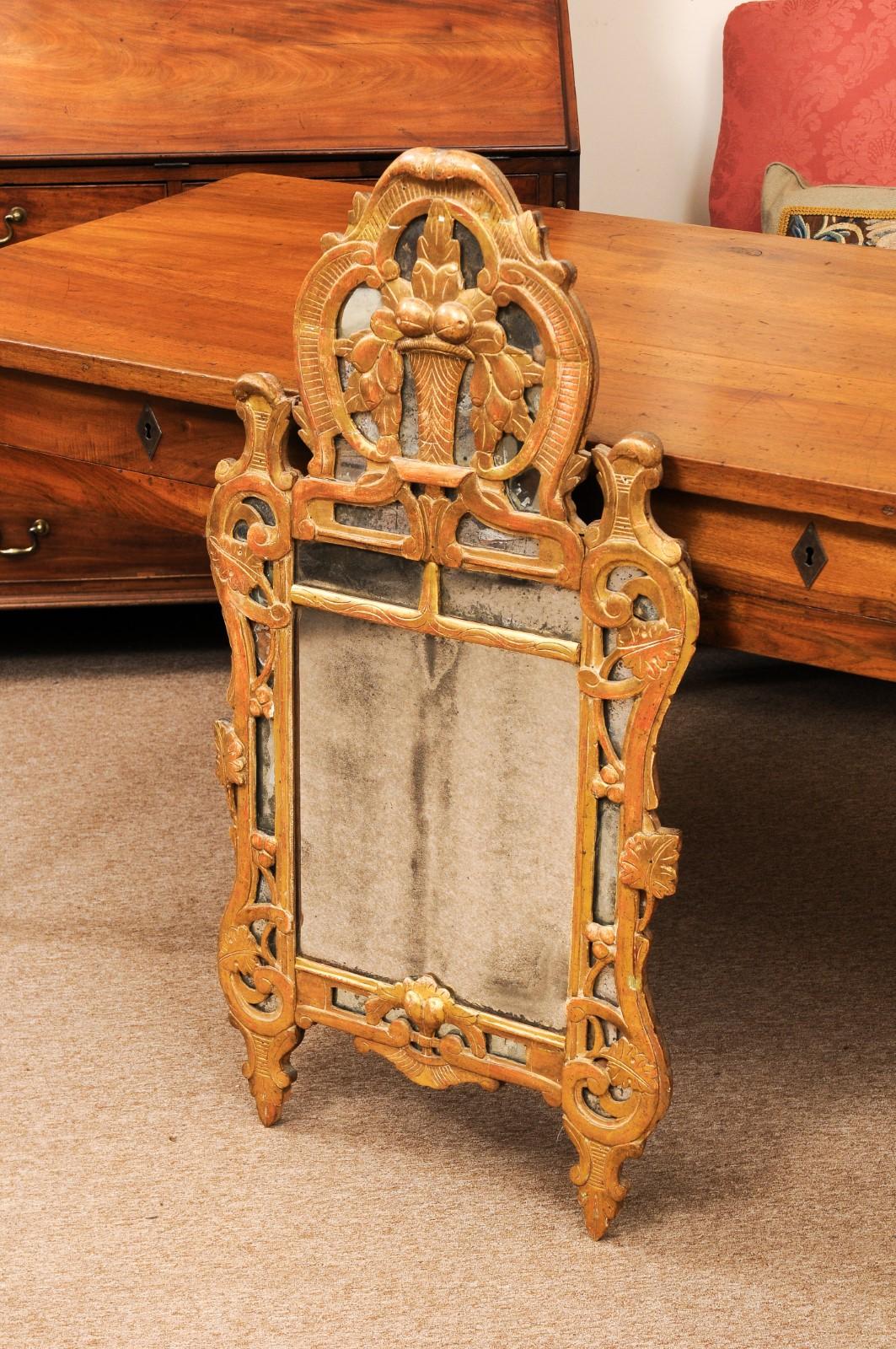 18th Century and Earlier 18th Century French Louis XV Giltwood Mirror with Basket Crest For Sale