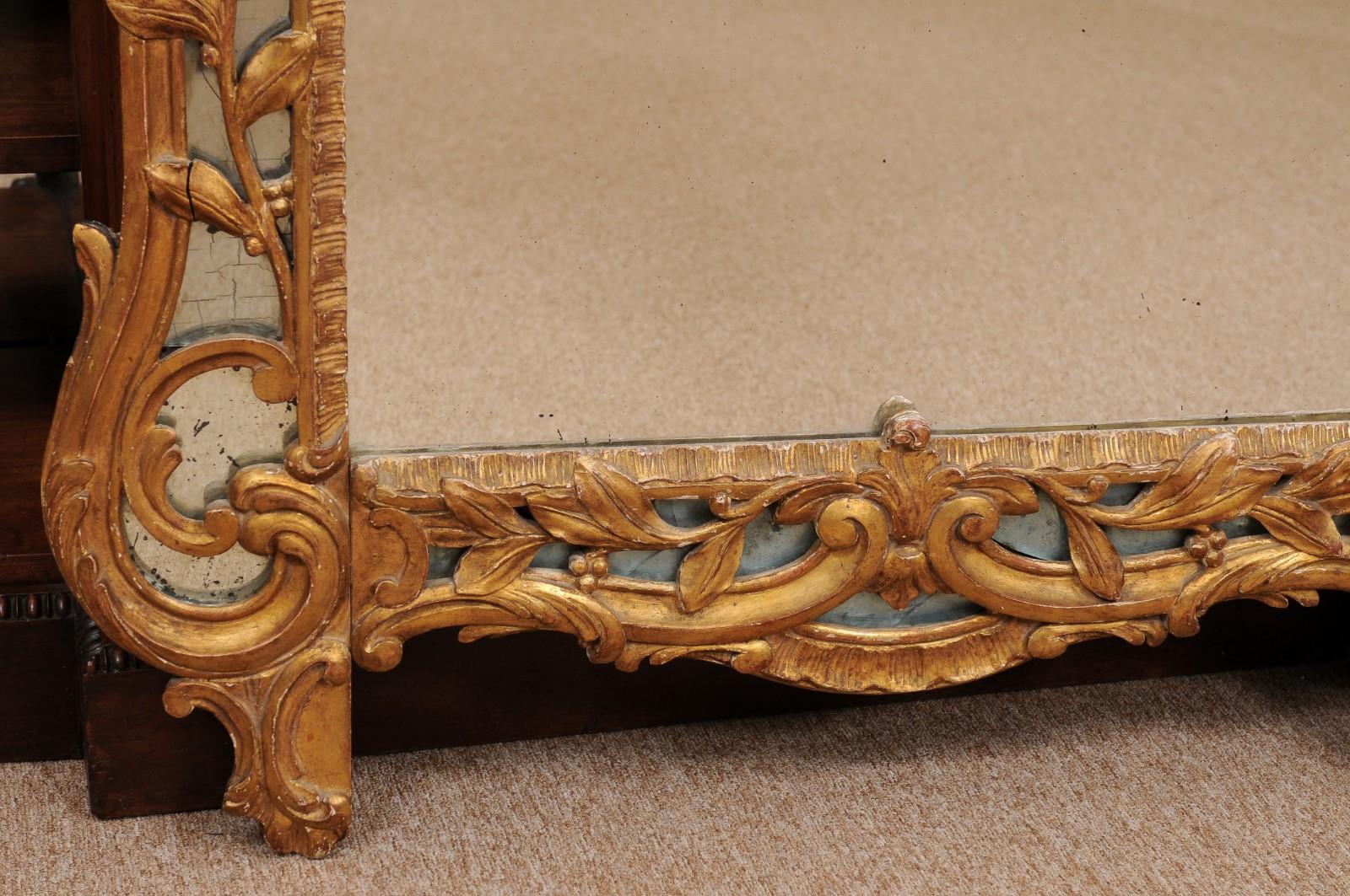 18th Century and Earlier 18th Century French Louis XV Giltwood Mirror with Floral Basket Crest For Sale