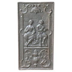 Plaque de cheminée / dosseret "Homme et Femme" Louis XV du 18e siècle