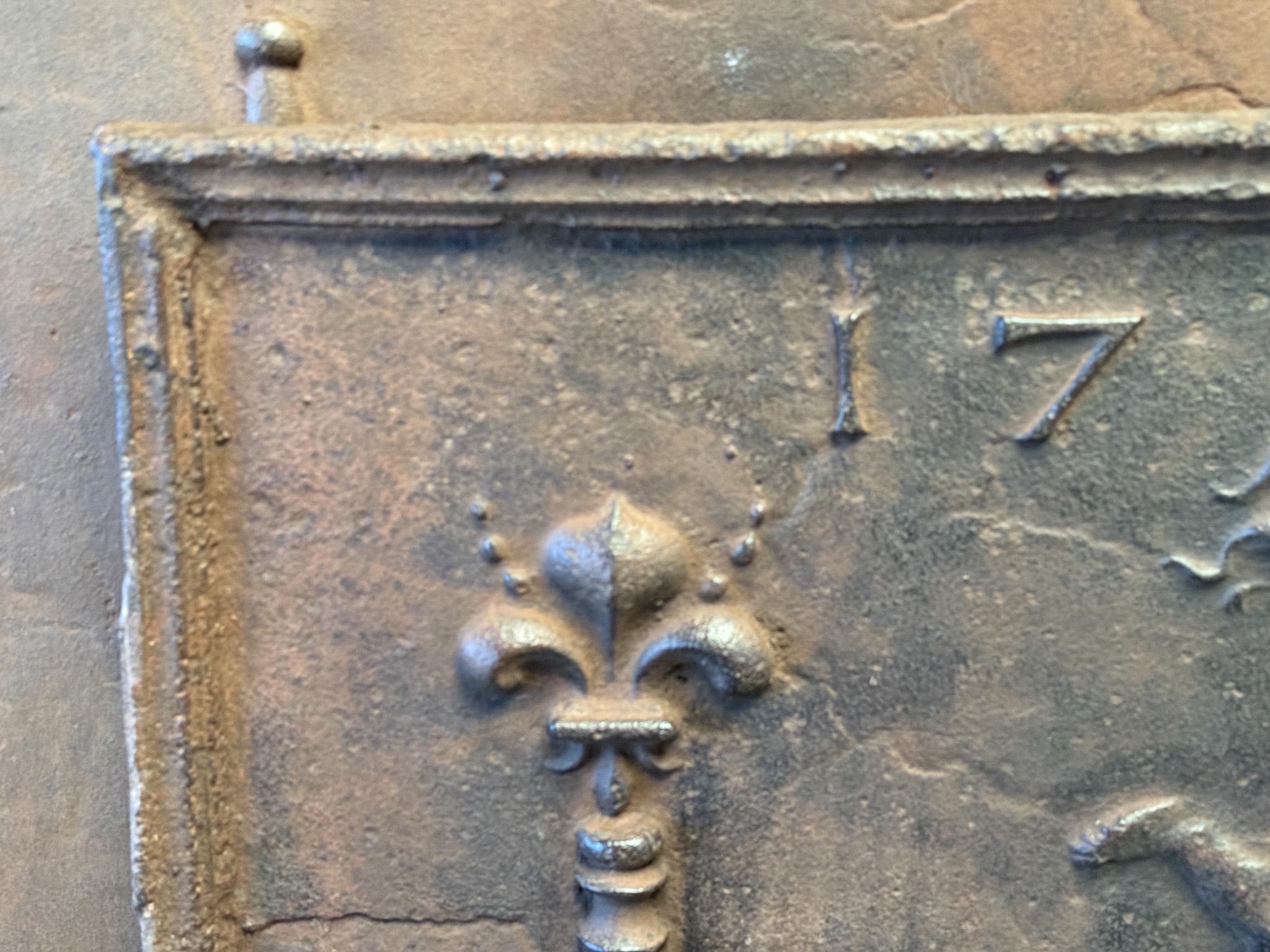 Iron 18th Century French Louis XIV Period 'Cupid' Fireback / Backsplash For Sale