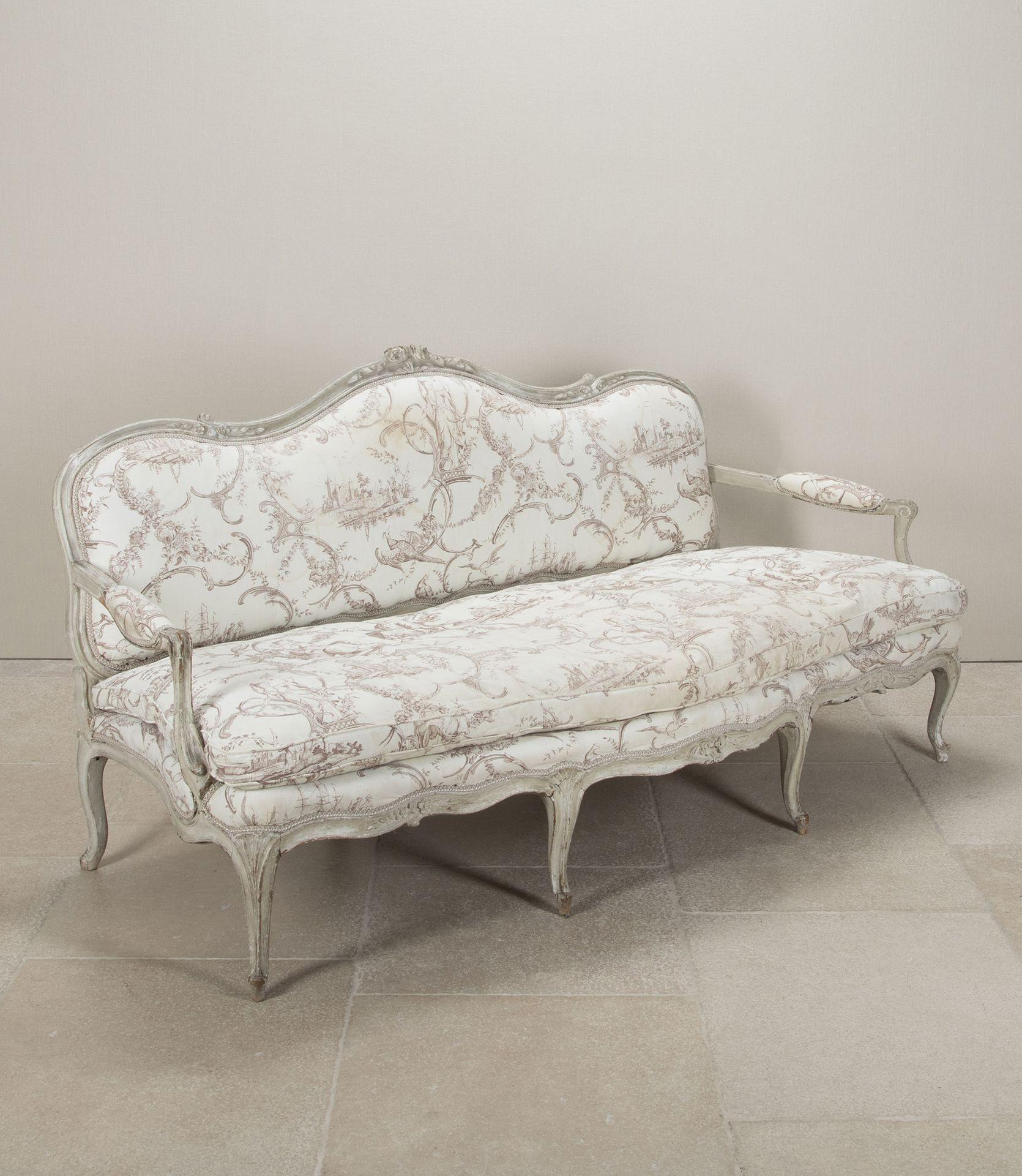 A grand scale 18th Century French Louis XV sofa.
