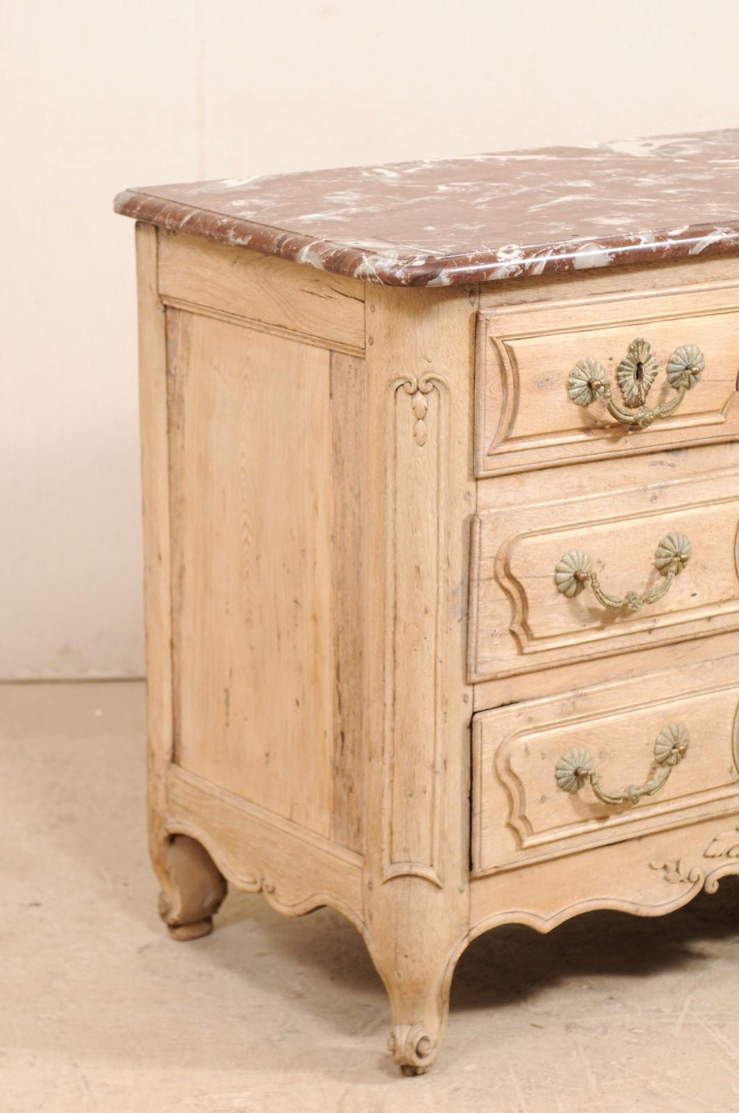 An 18th Century French Louis XV Provincial Four-Drawer Marble Top Wood Chest In Good Condition For Sale In Atlanta, GA