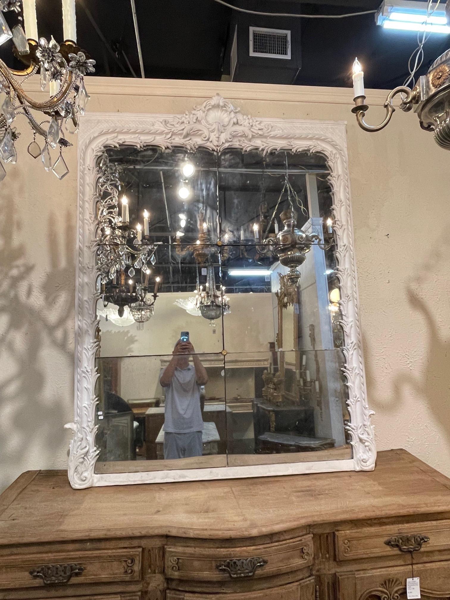 Exquisite large scale 18th century French Louis XV style carved and painted mirror with original divided mercury glass. Beautiful carvings including a decorative crest at the top. Fabulous!!