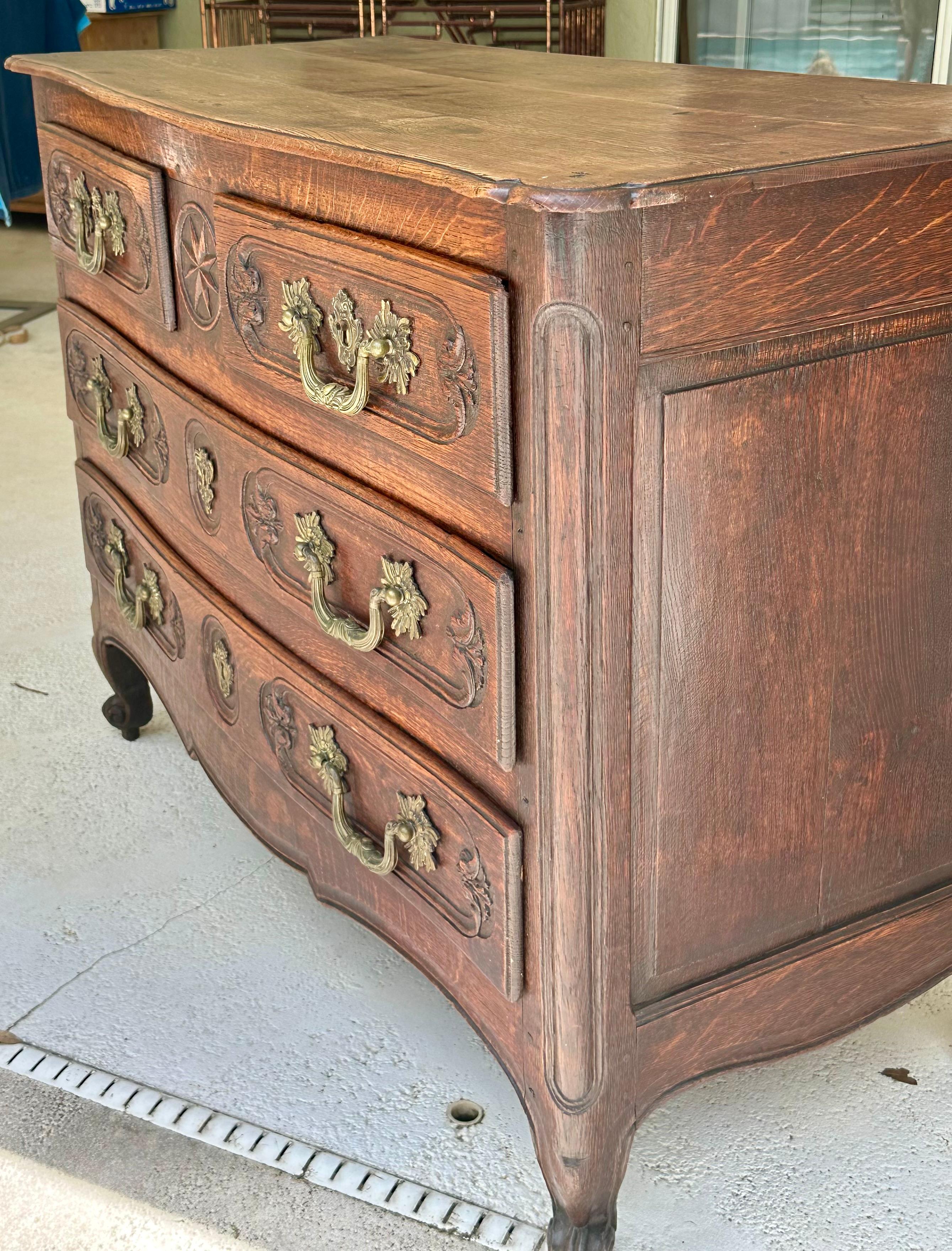Carved 18th Century French Louis XV Walnut and Oak Chest of Drawers For Sale