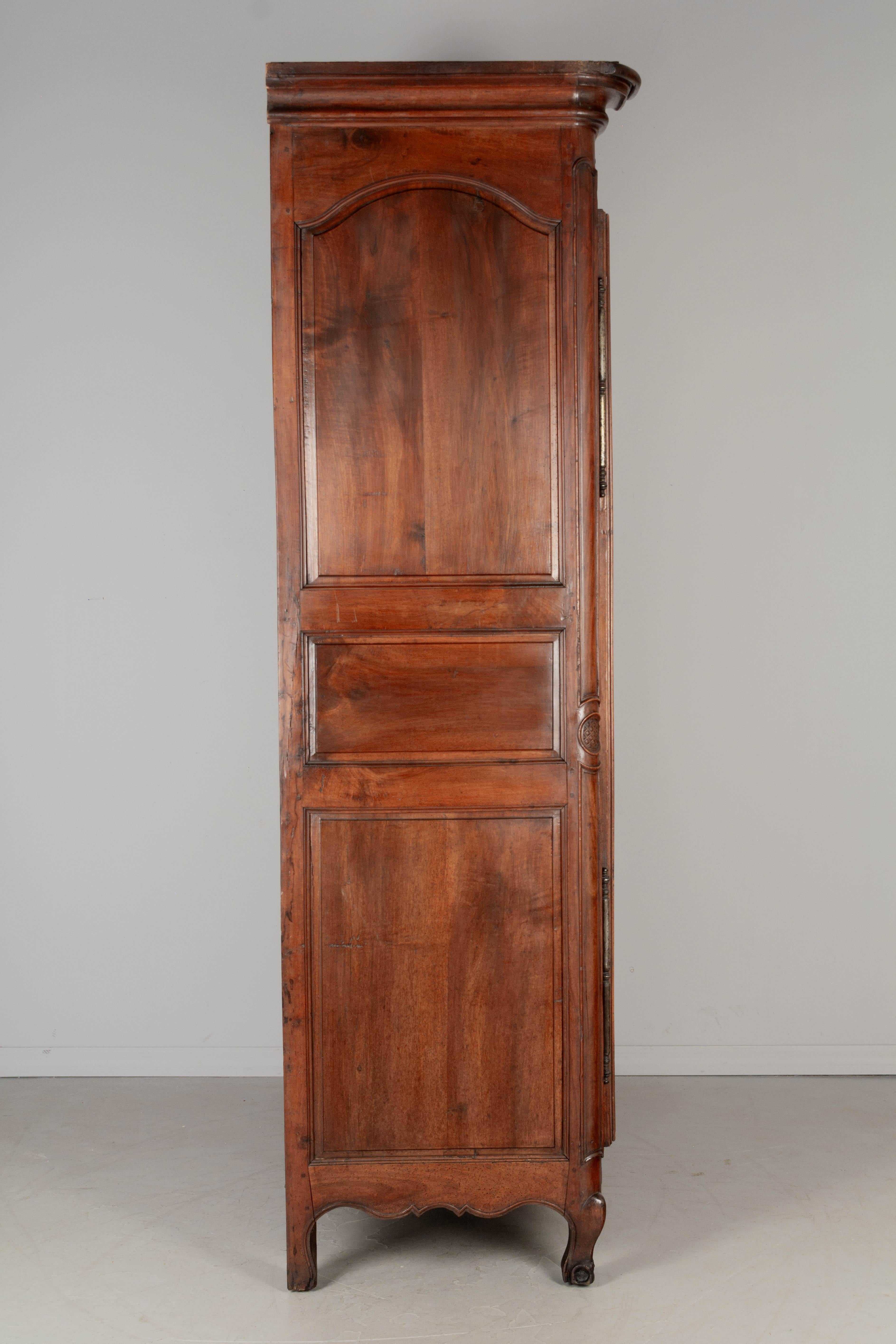18th Century and Earlier 18th Century French Louis XV Walnut Armoire For Sale