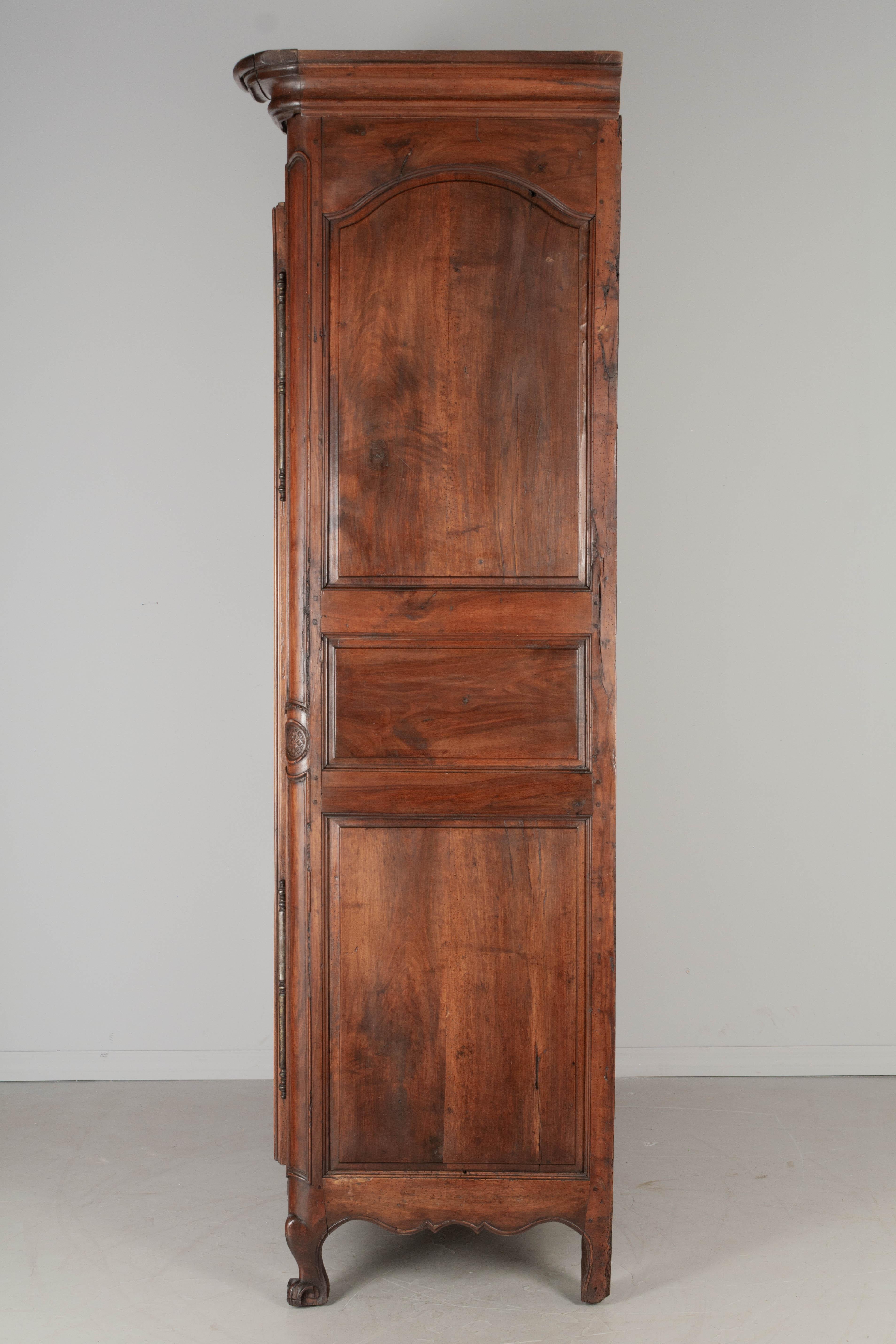 Iron 18th Century French Louis XV Walnut Armoire For Sale