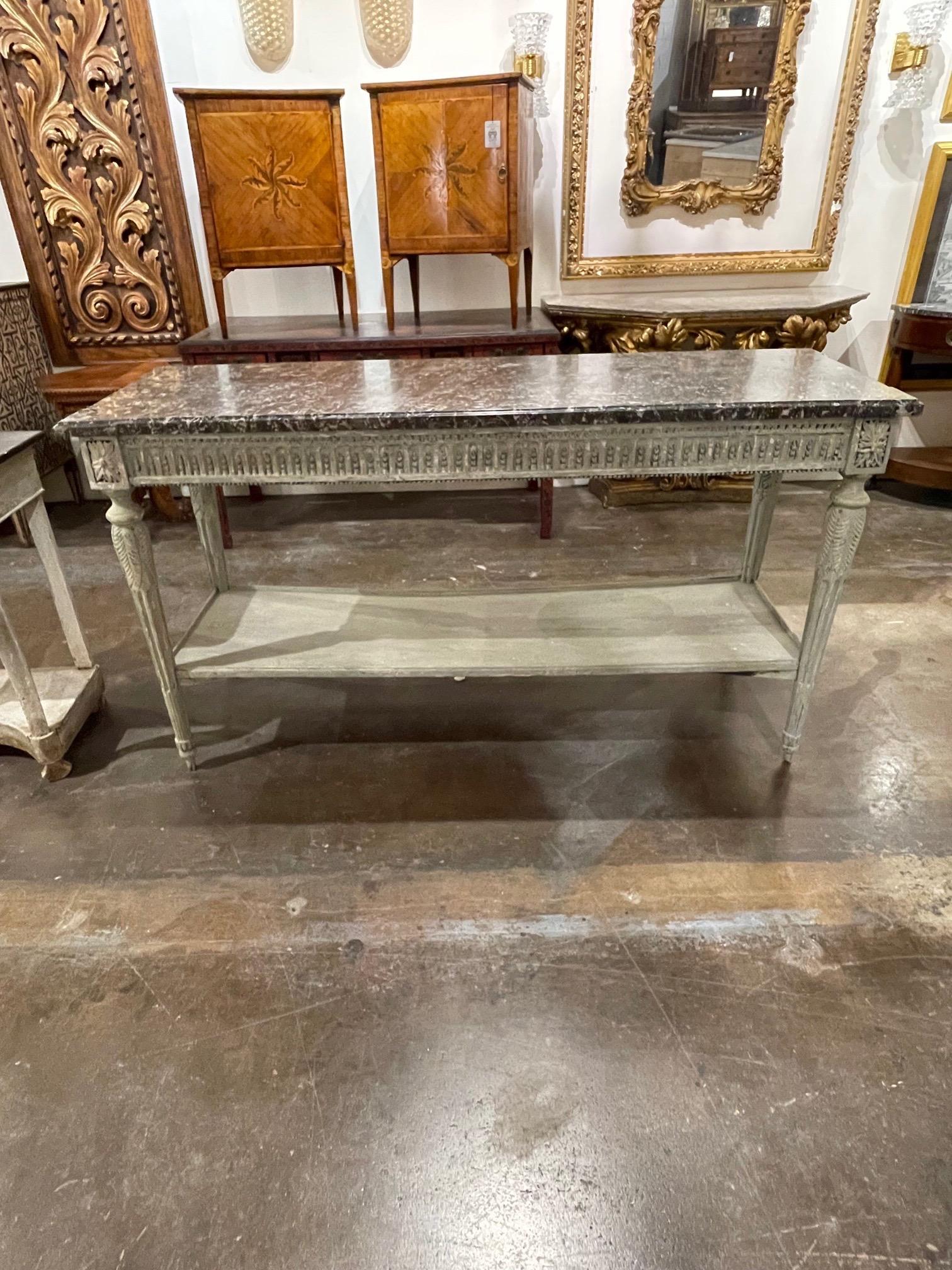 Very special 18th century French Louis XVI carved and painted console with original marble top. Exceptional carvings and beautiful patina! Exquisite!