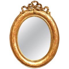 18th Century French Louis XVI Carved Giltwood Oval Wall Mirror