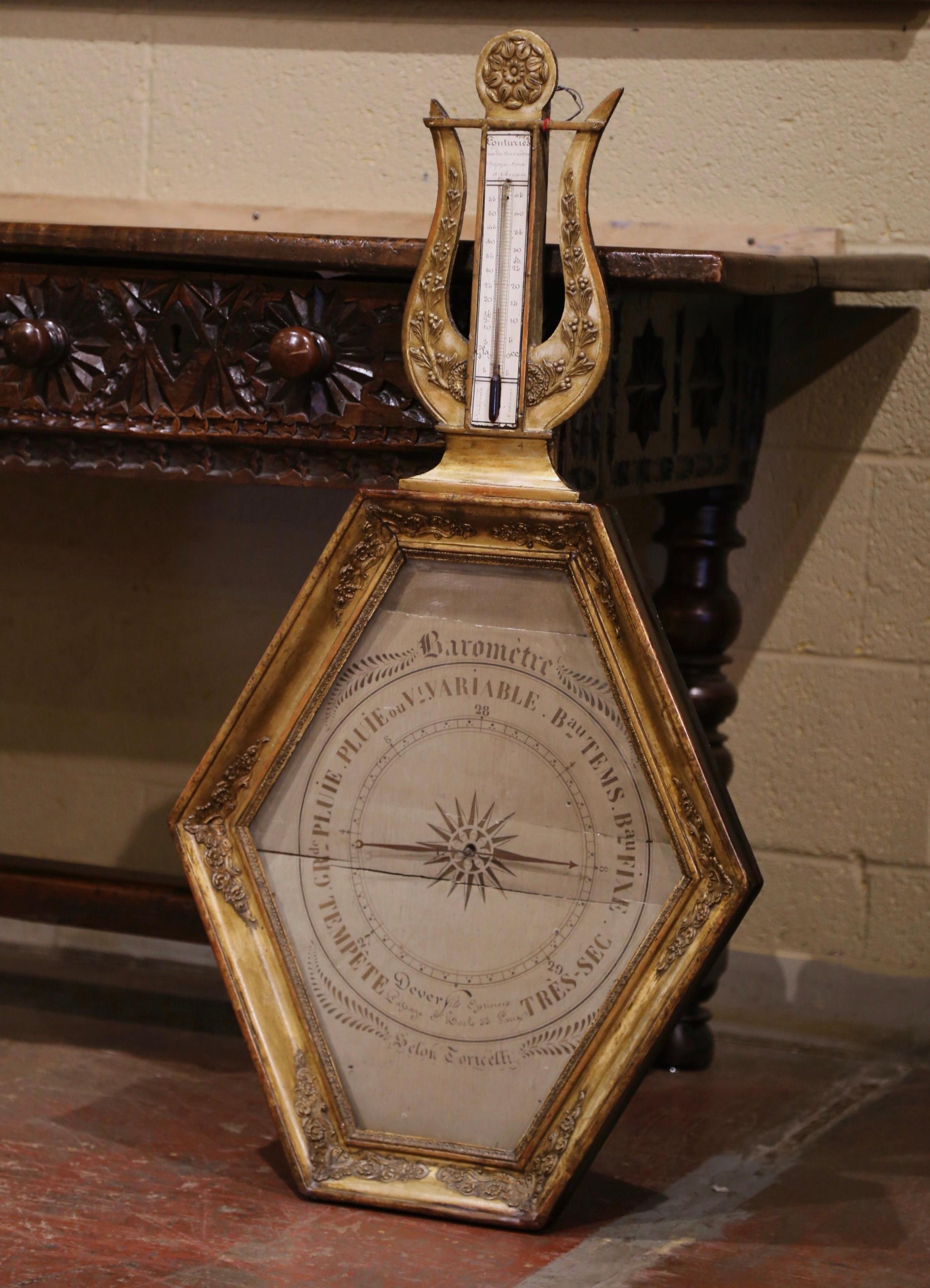 Decorate a wall with this elegant, antique barometer with attached thermometer. Crafted in Paris, France, circa 1760 and hexagonal in shape, the scientific instrument features its original hand painted parchment paper with French inscriptions