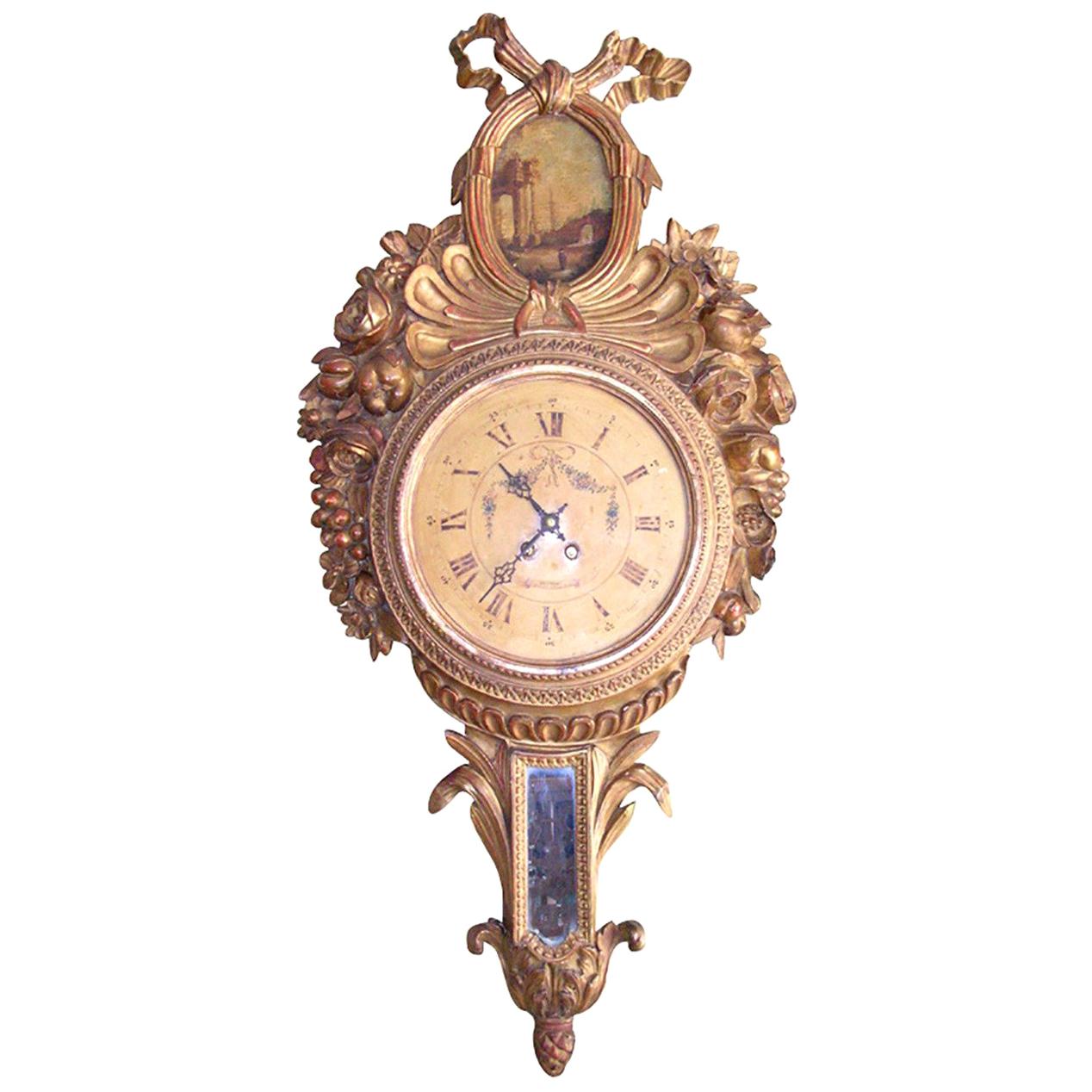 18th Century French Louis XVI Carved Giltwood Wall Clock with Oval Painting For Sale