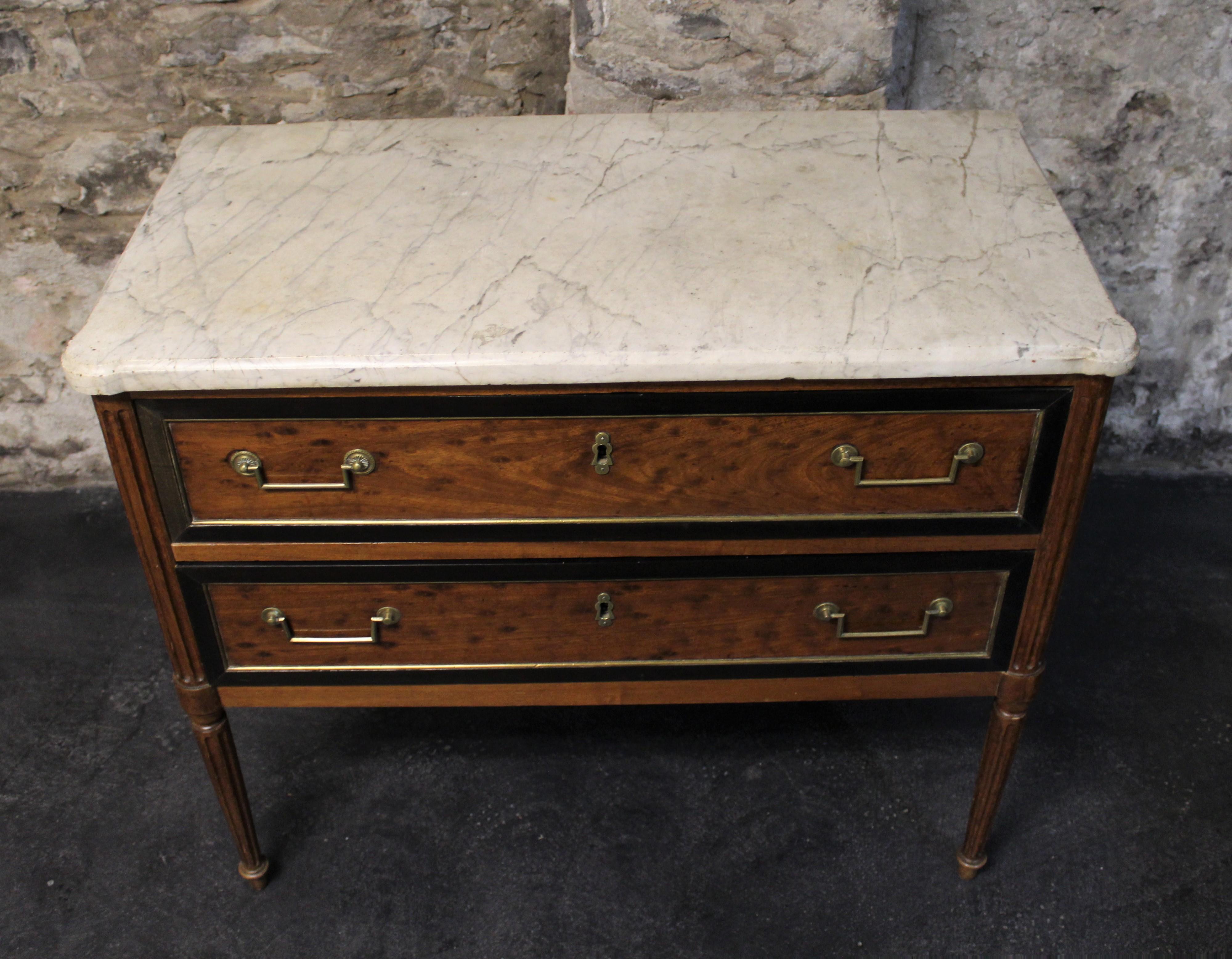 18th century French Louis XVI two-drawer speckled mahogany commode with marble top.