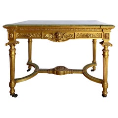 Table console française Louis XVI du 18ème siècle en bois doré avec plateau en onyx inséré