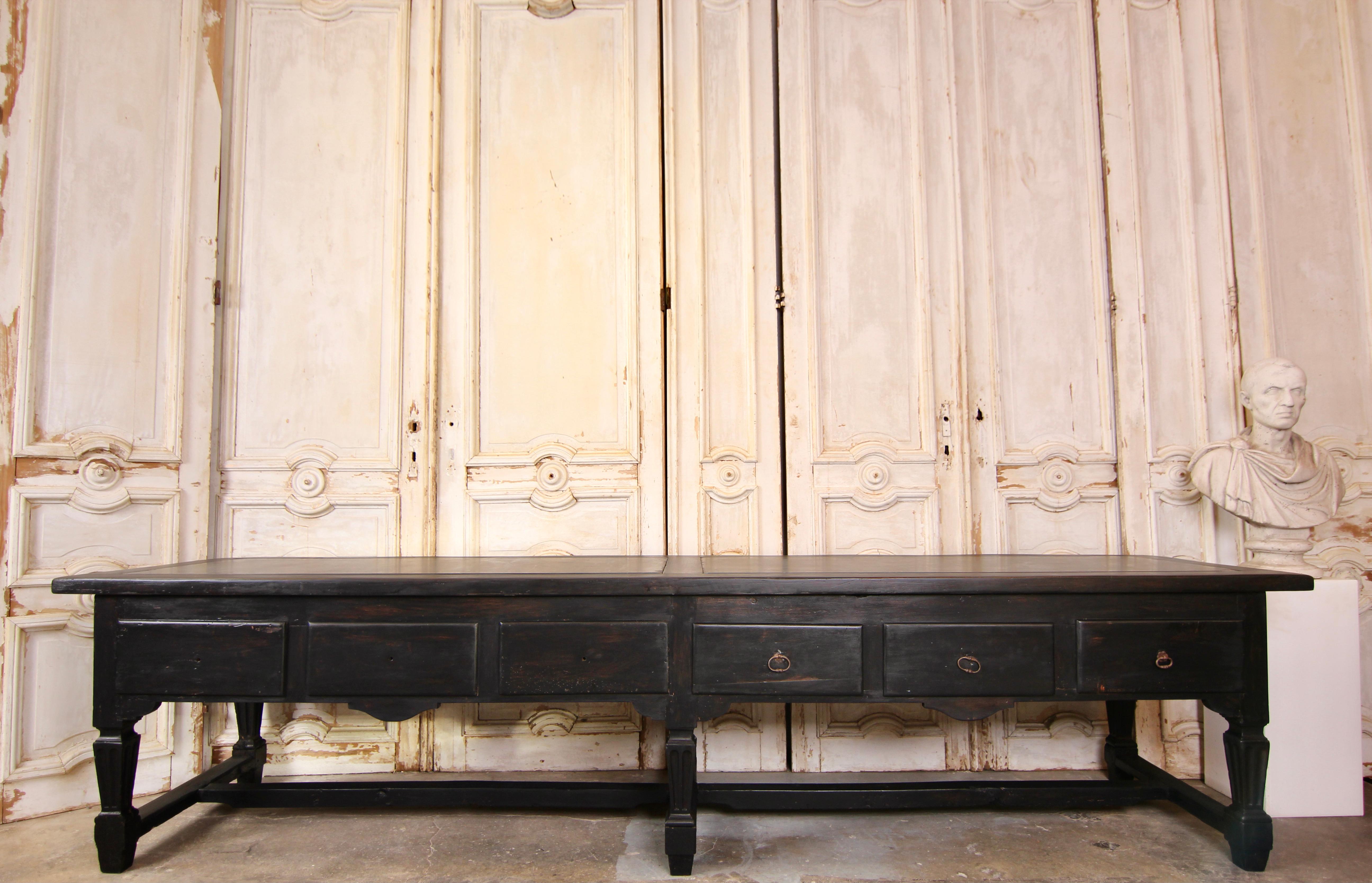 Large Louis XVI kitchen prep table. France, c. 1760. Oak wood with 2 inlaid slabs of bluestone.

This unique freestanding work table was made for a country estate or chateau in the 18th century. It formed the centre of a large kitchen and is