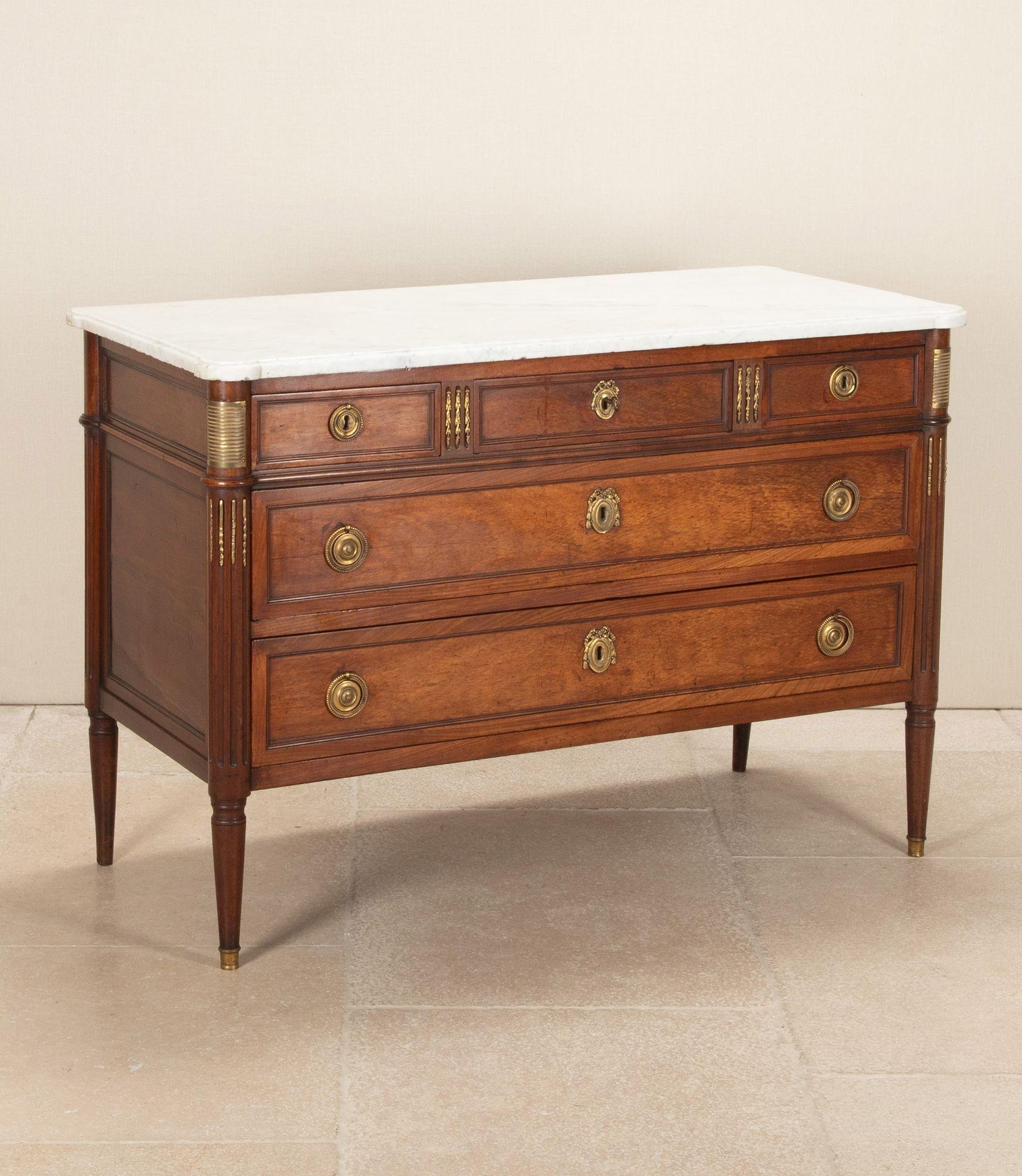 18th Century French Louis XVI mahogany commode.
With original Carrara marble top and key. Brass bound throughout. With minor restoration.