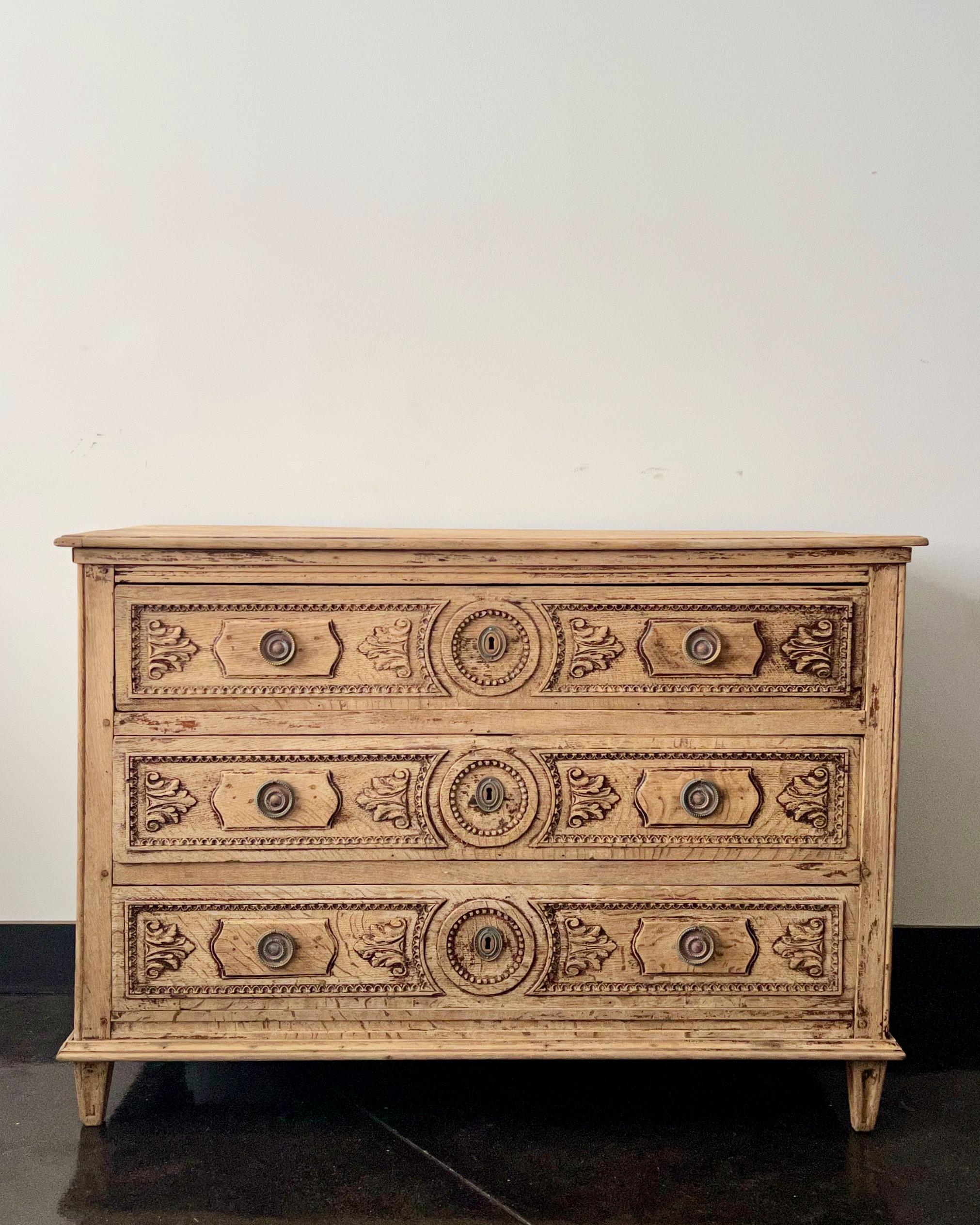 An exquisite 18th century French Louis XVI commode in bleached oak with richly carved drawer fronts and paneled sides and beautiful original hardware,
More than ever, we selected the best, the rarest, the unusual, the spectacular, the most charming