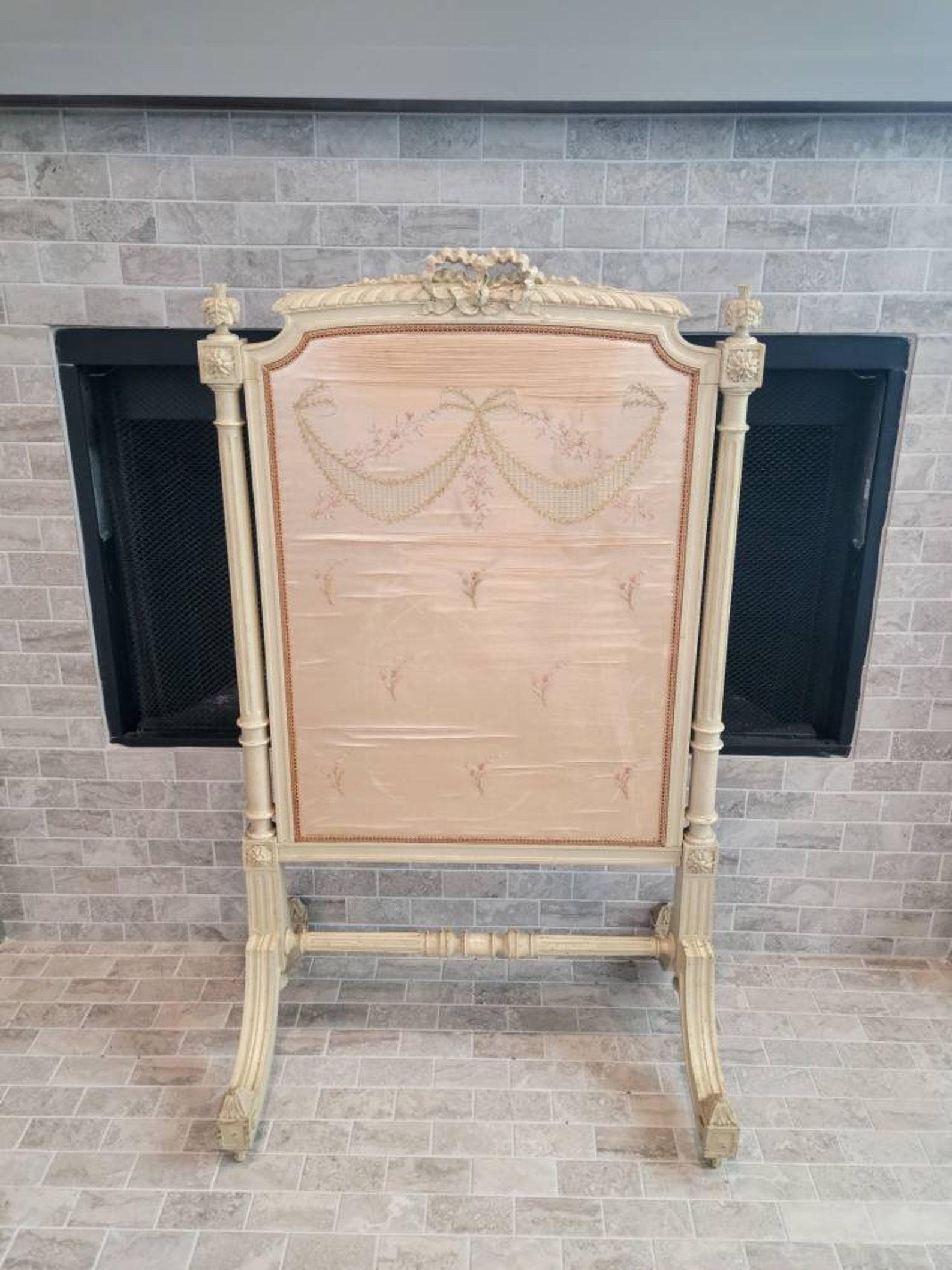 A scarce period Louis XVI hand carved wooden fire screen (Écran de Cheminée) in the manner of important Parisian menuisiers Georges Jacob (French, 1739-1814) retaining the original brocaded silk textile panel. circa 1780s

Born in France in the late