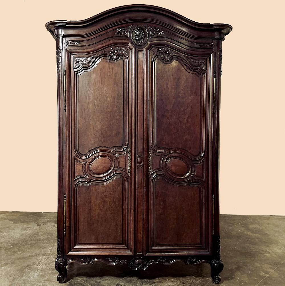 18th century French Louis XVI period mahogany armoire is a true gem of the cabinetmaker's art! Only rarely do we come across pieces from the Louis XVI period around the time of our great nation's founding that are so exquisite and well-preserved.