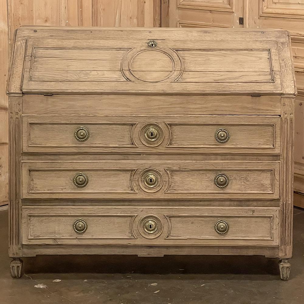 18th Century French Louis XVI Period Secretary was commissioned on a larger scale than was the norm at the time, providing voluminous storage in three full width drawers, a high working surface when open, and a complex configuration of interior