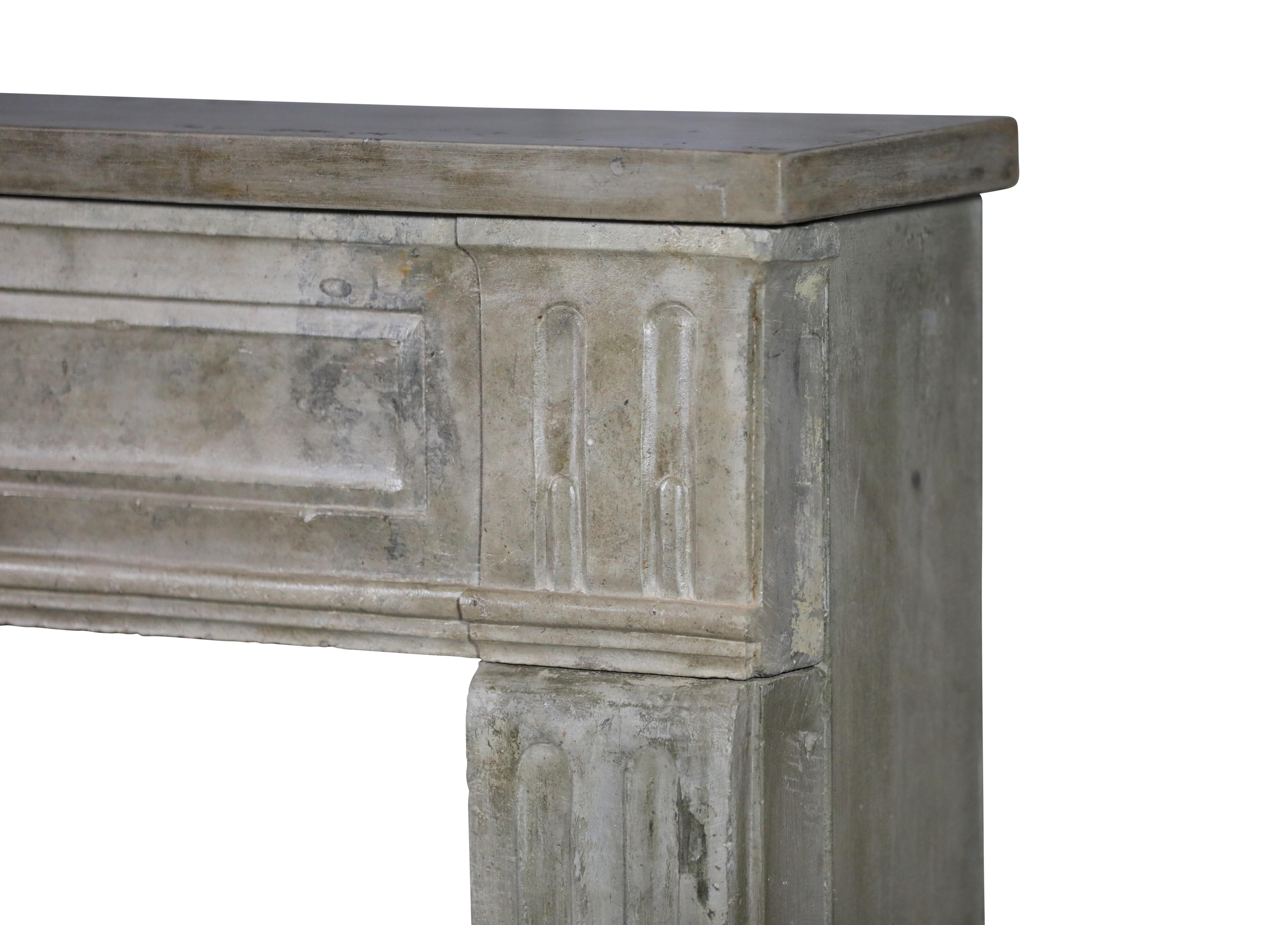 Limestone 18th Century French Louis XVI Statement Fireplace From Paris For Sale