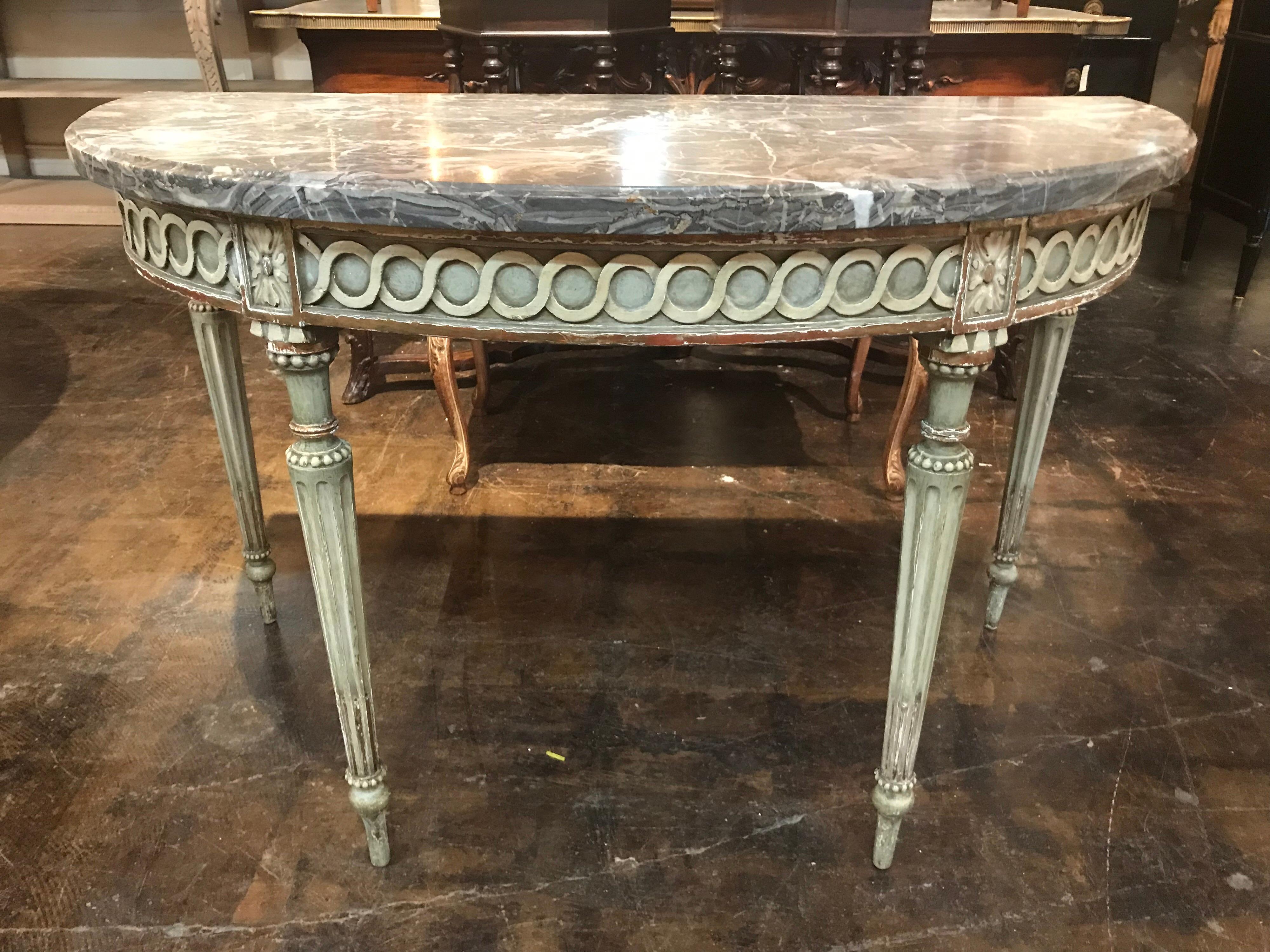 Beautiful original 18th century. French demilune console. Nicely carved with original paint finish and original thick grey marble top. Structurally sound and very pleasing to the eye. Quality and style, ready to make a great addition to any Fine