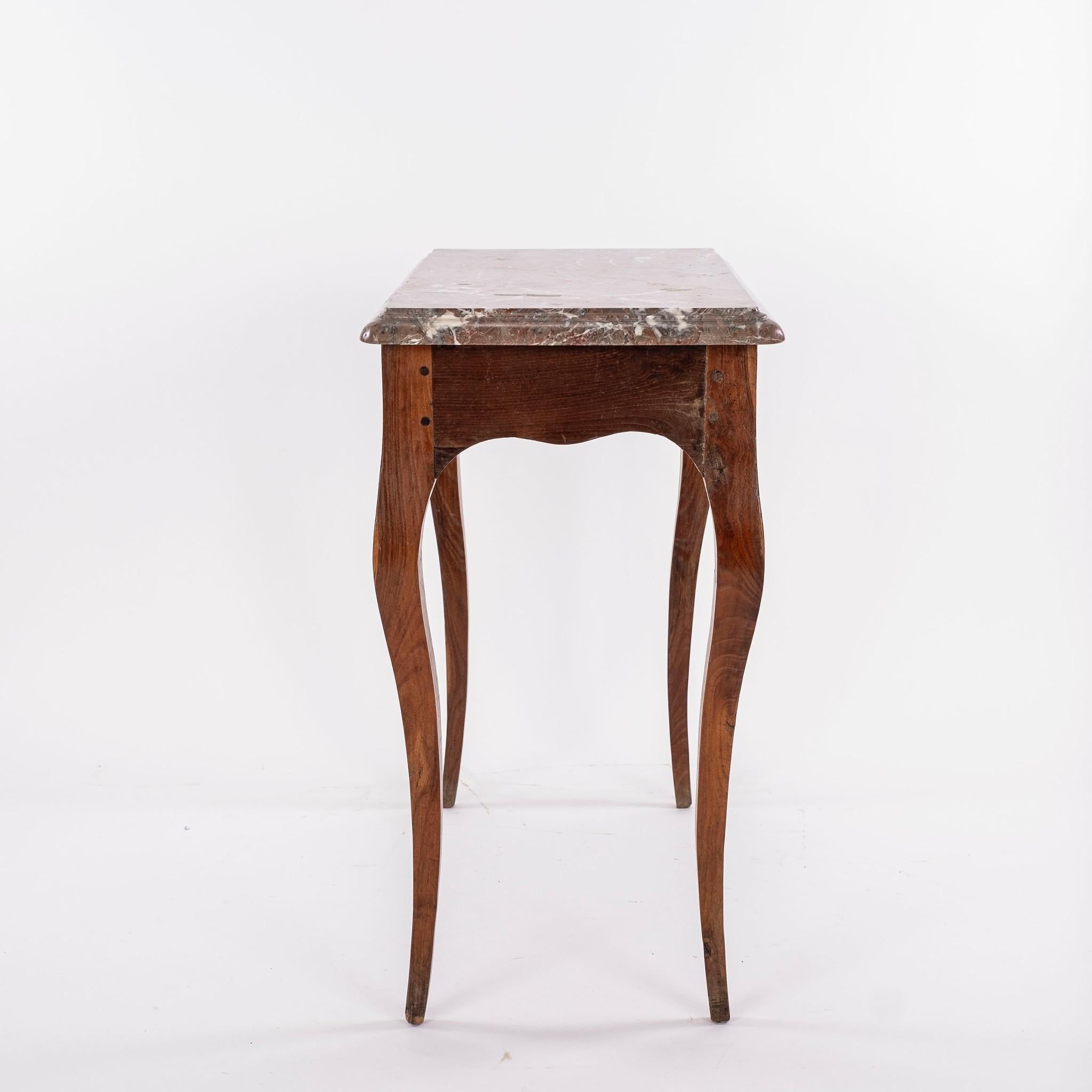 18th Century French Louis XVI hand carved walnut console with marble top.