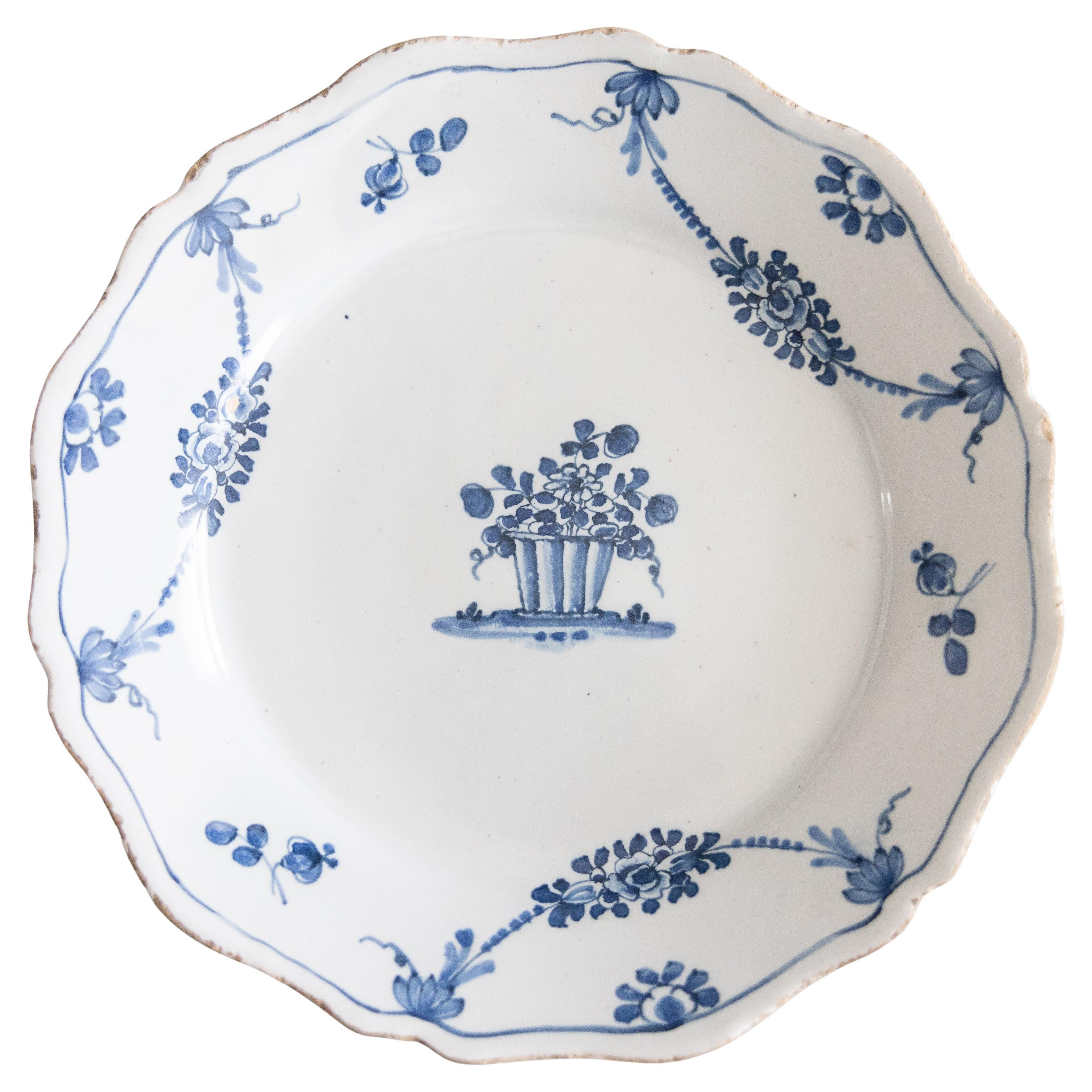 18th Century French Nevers Blue
White Faience Scalloped Floral Plate