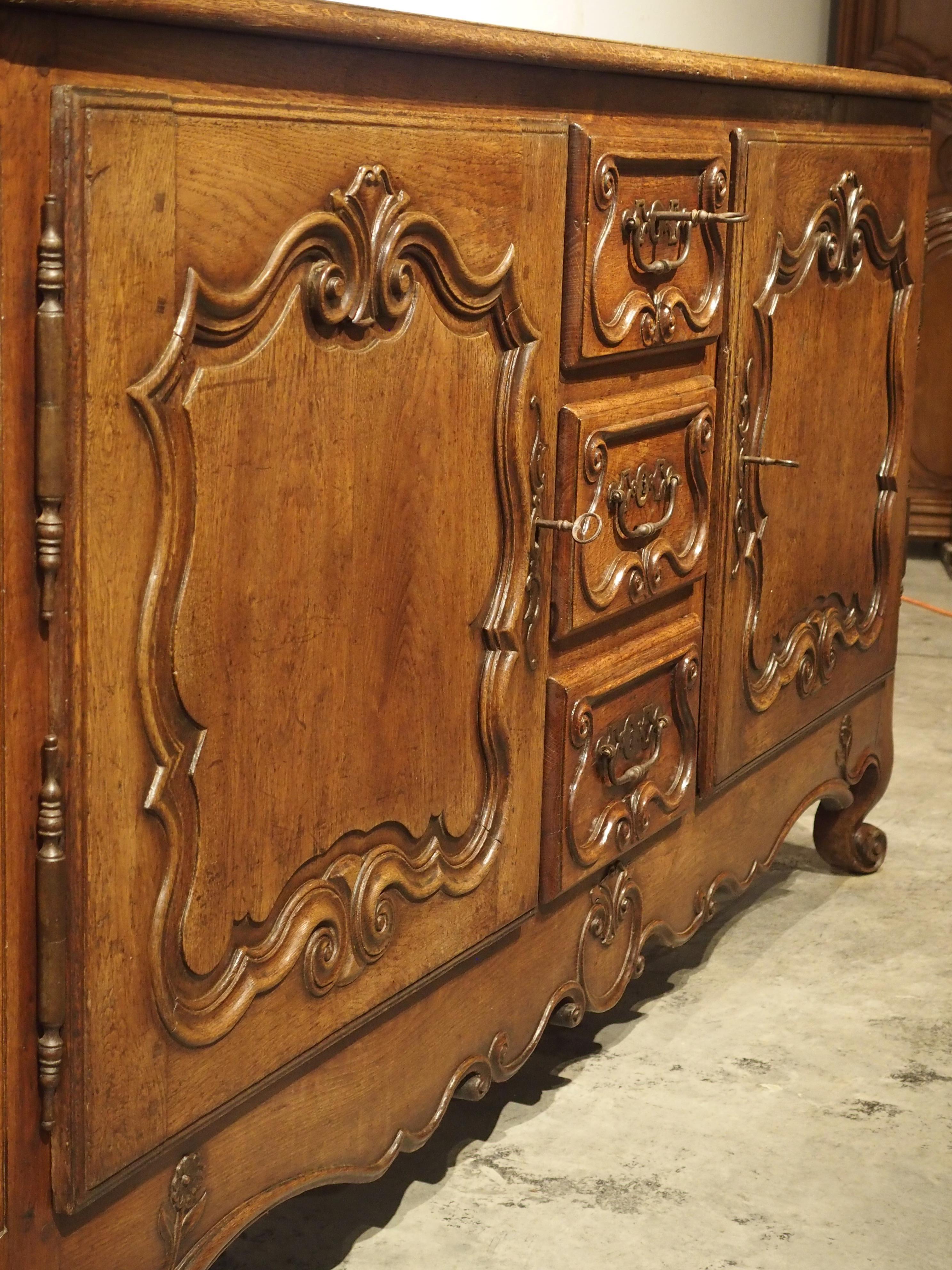 Hand-Carved 18th Century French Oak Buffet with Center Drawers from Lorraine
