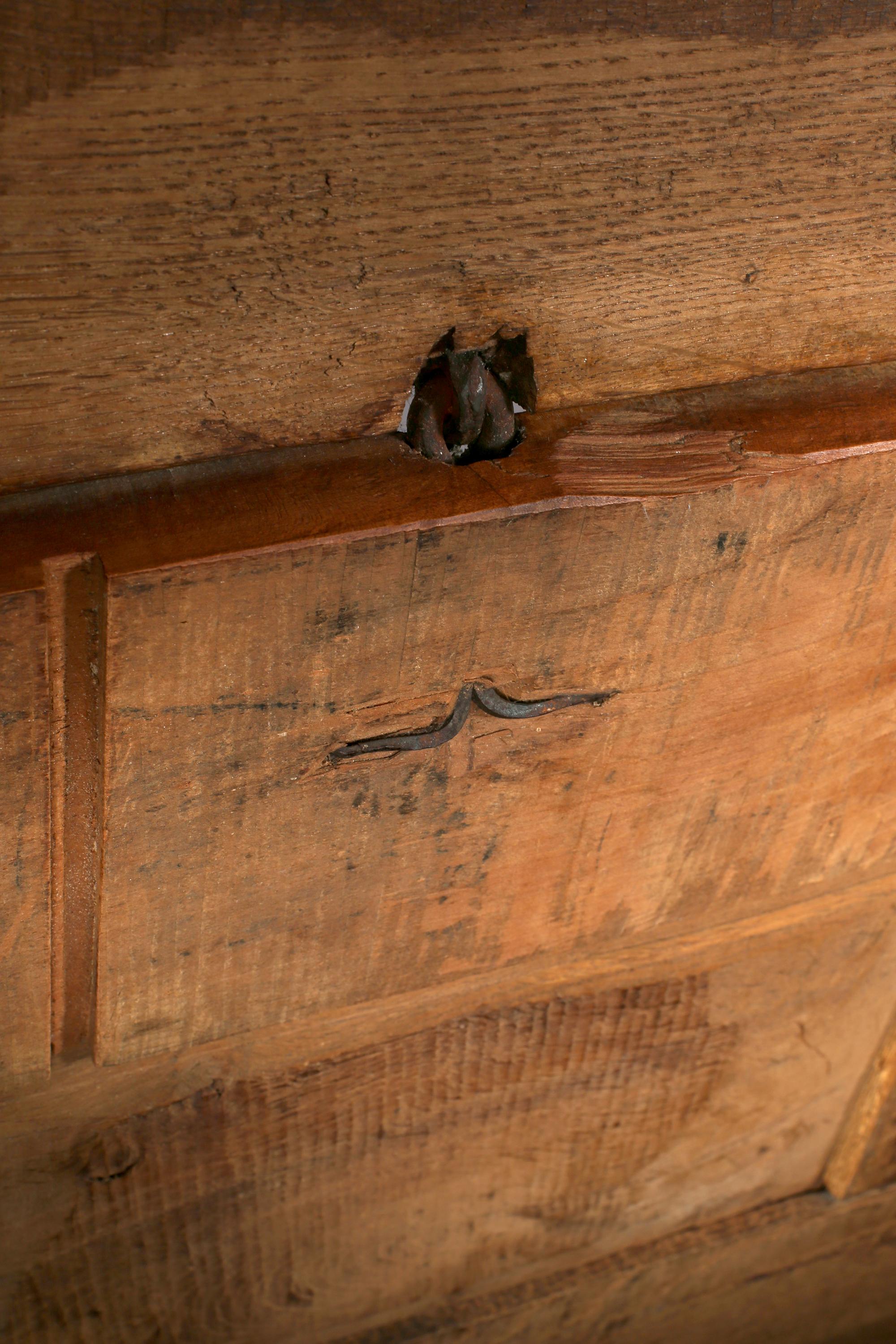 A charming early 18th century solid oak coffer or chest from Aubusson. Simple in form, with caved panelling in the Auvergne taste. French, circa 1720.