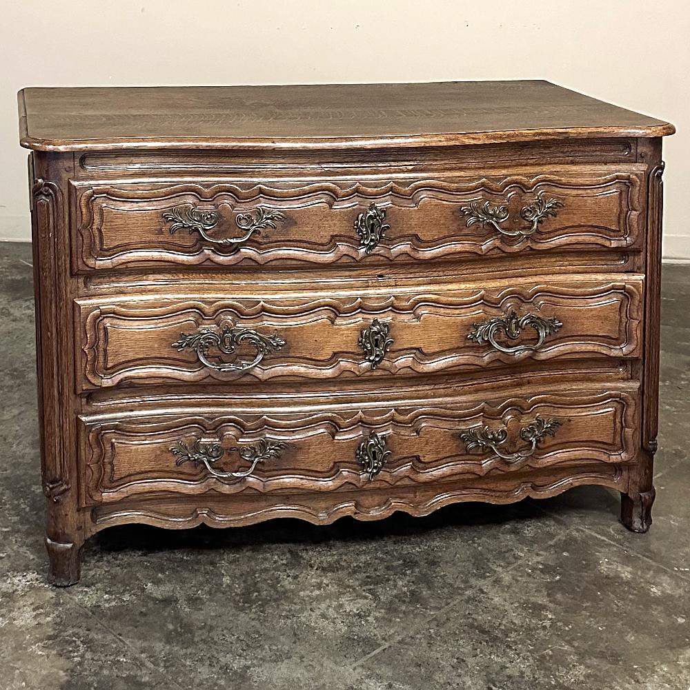 18th Century French Oak Commode was considered an essential part of many rooms of a proper home during the 1700s, not just used for clothing, but for linens and other items for daily use.  This example, rendered from hand-selected old-growth oak,