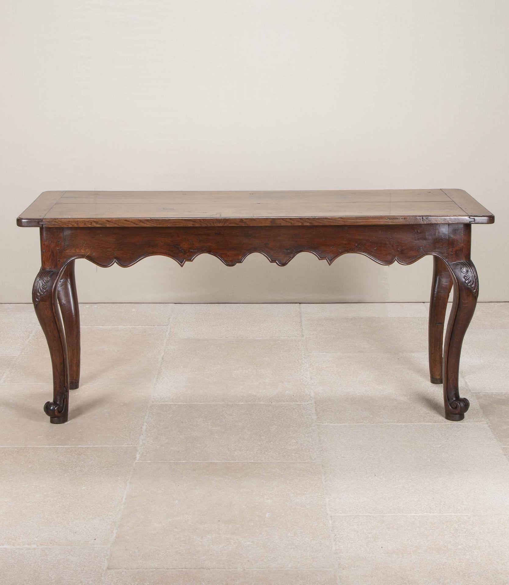 Stunning example of an 18th Century French oak console or serving table.
With wonderful colour and patina and carved shell motif to the shoulders of the legs. A few historic repairs to the feet but nothing you wouldn’t expect from a piece of this