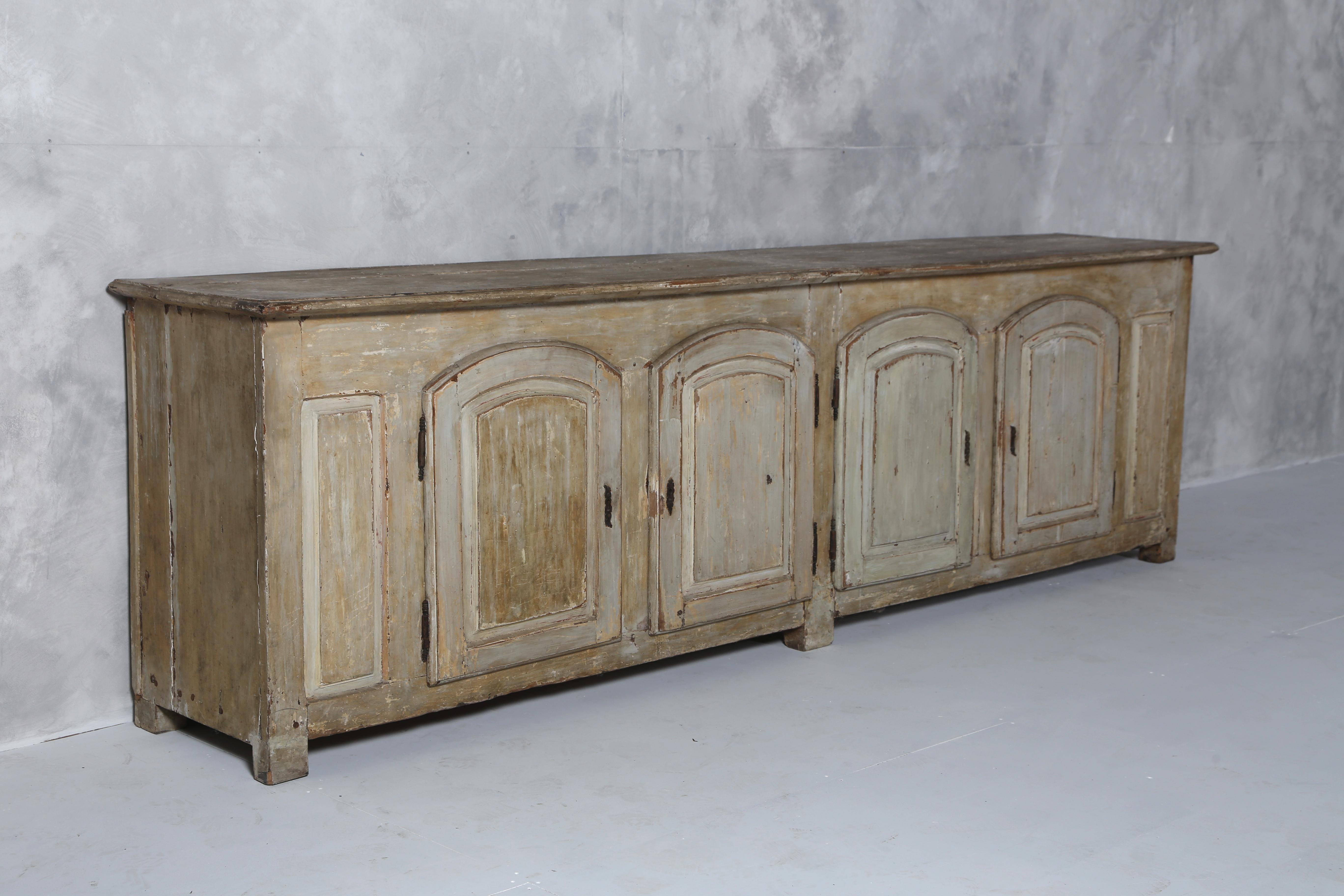 French 18th century Oak Enfilade with its original paintwork, all the doors work well and the overall condition is good.