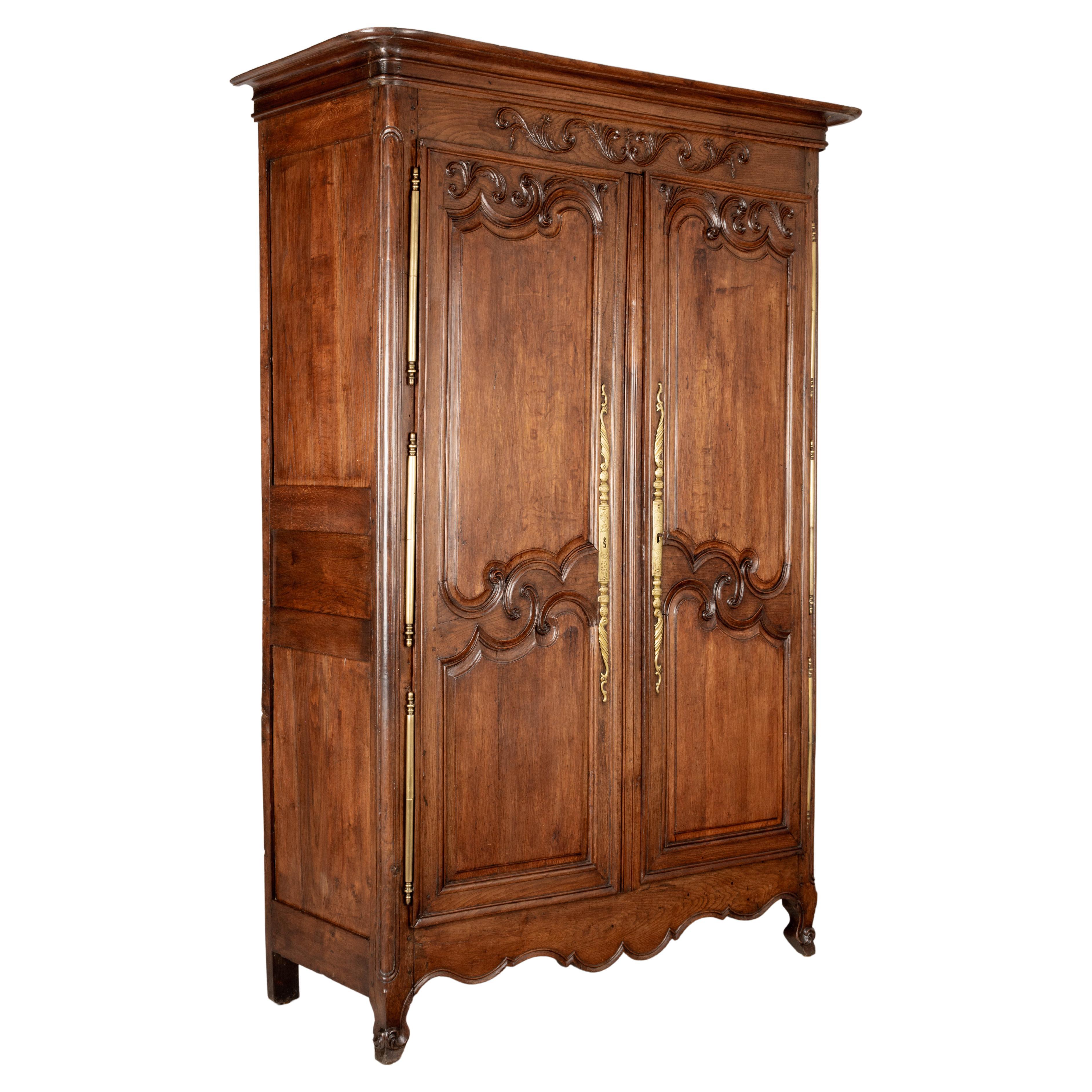 18th C. Heavily Carved Antique French Normandy Wedding Armoire at 1stDibs