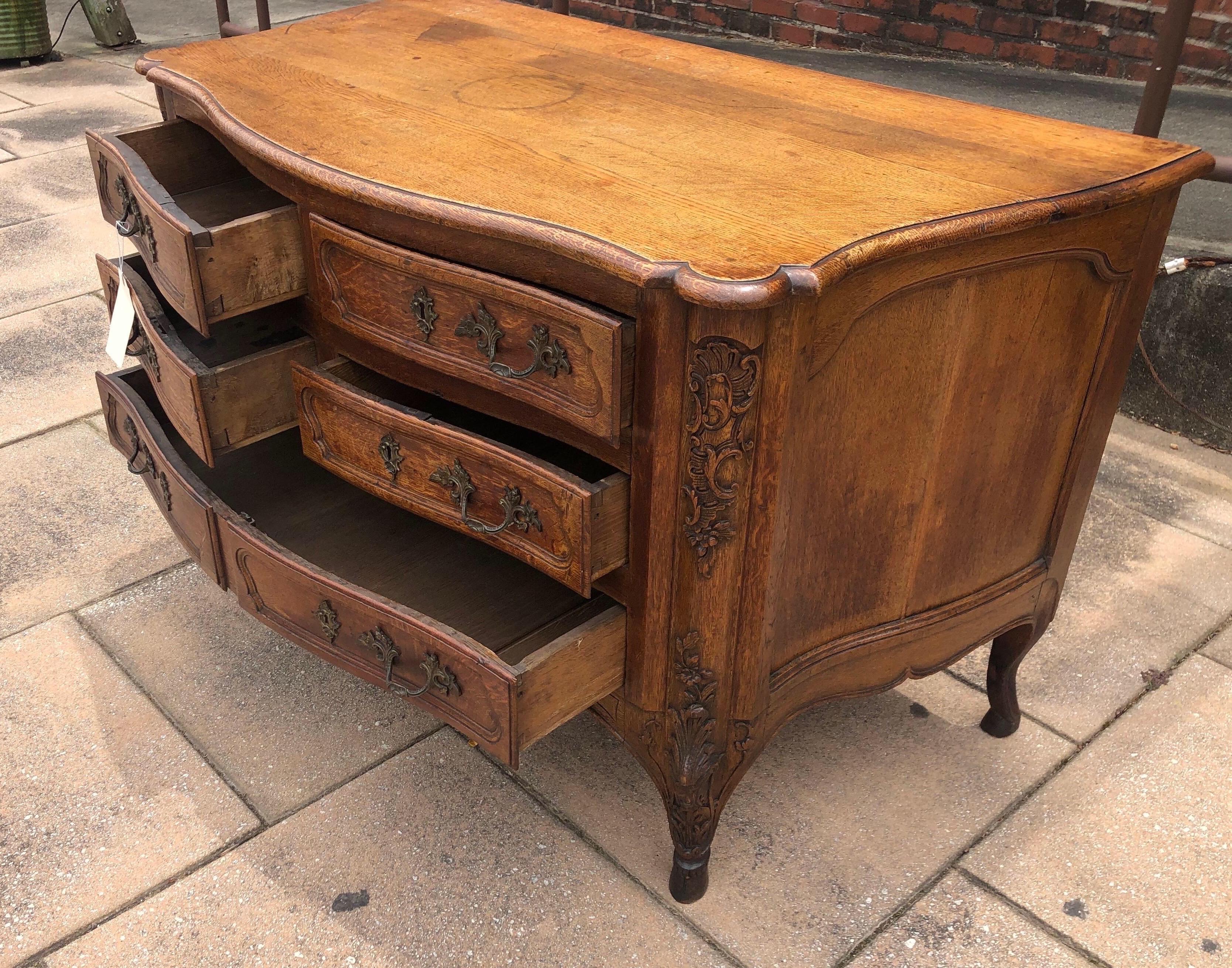 18th Century French Carved Oak Serpentine Commode on Hoof Feet For Sale 8