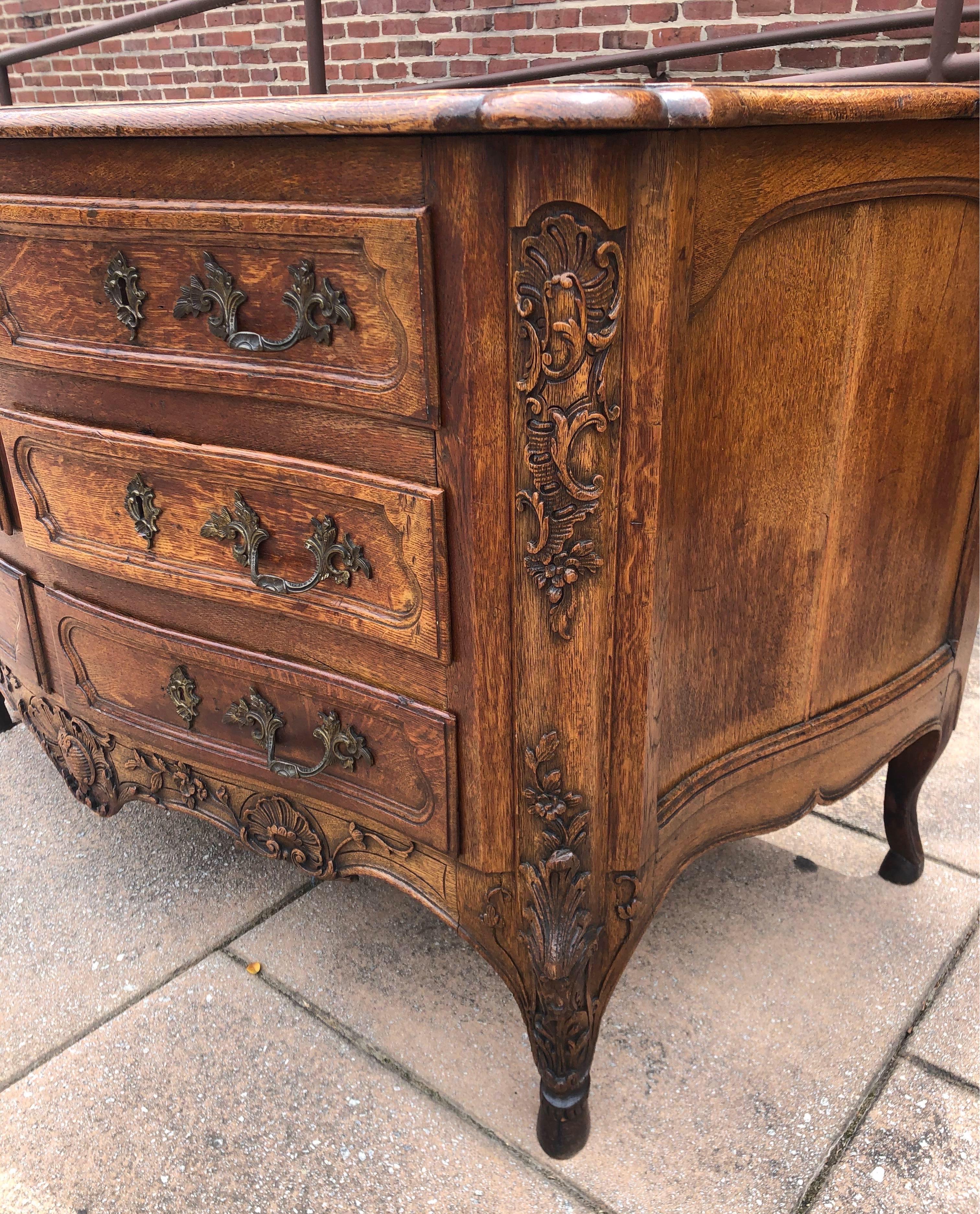 18th Century French Carved Oak Serpentine Commode on Hoof Feet For Sale 1