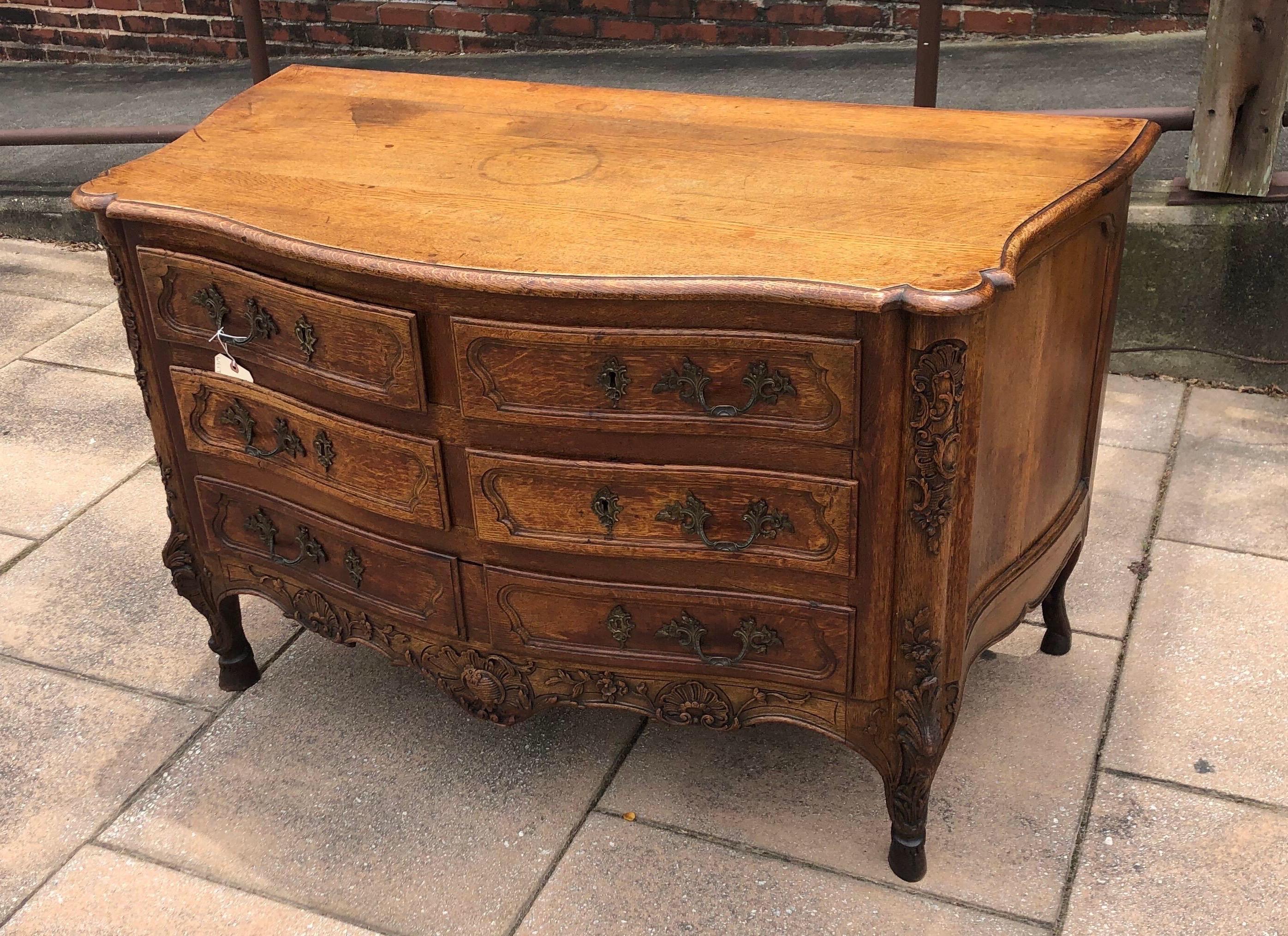 18th Century French Carved Oak Serpentine Commode on Hoof Feet For Sale 2