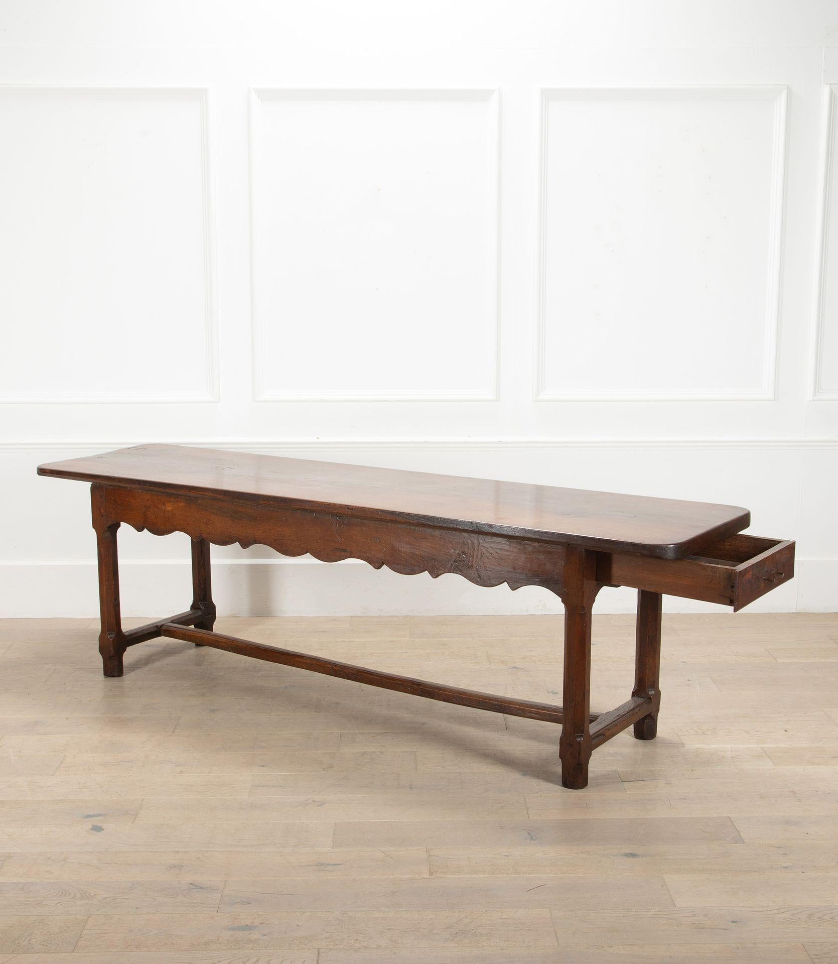 Great example of a late 18th Century French solid oak serving table or console table.
With a large single drawer to one end (a later replacement) with a hand forged handle. 
This table has been previously cleaned and polished.
Circa 1780.