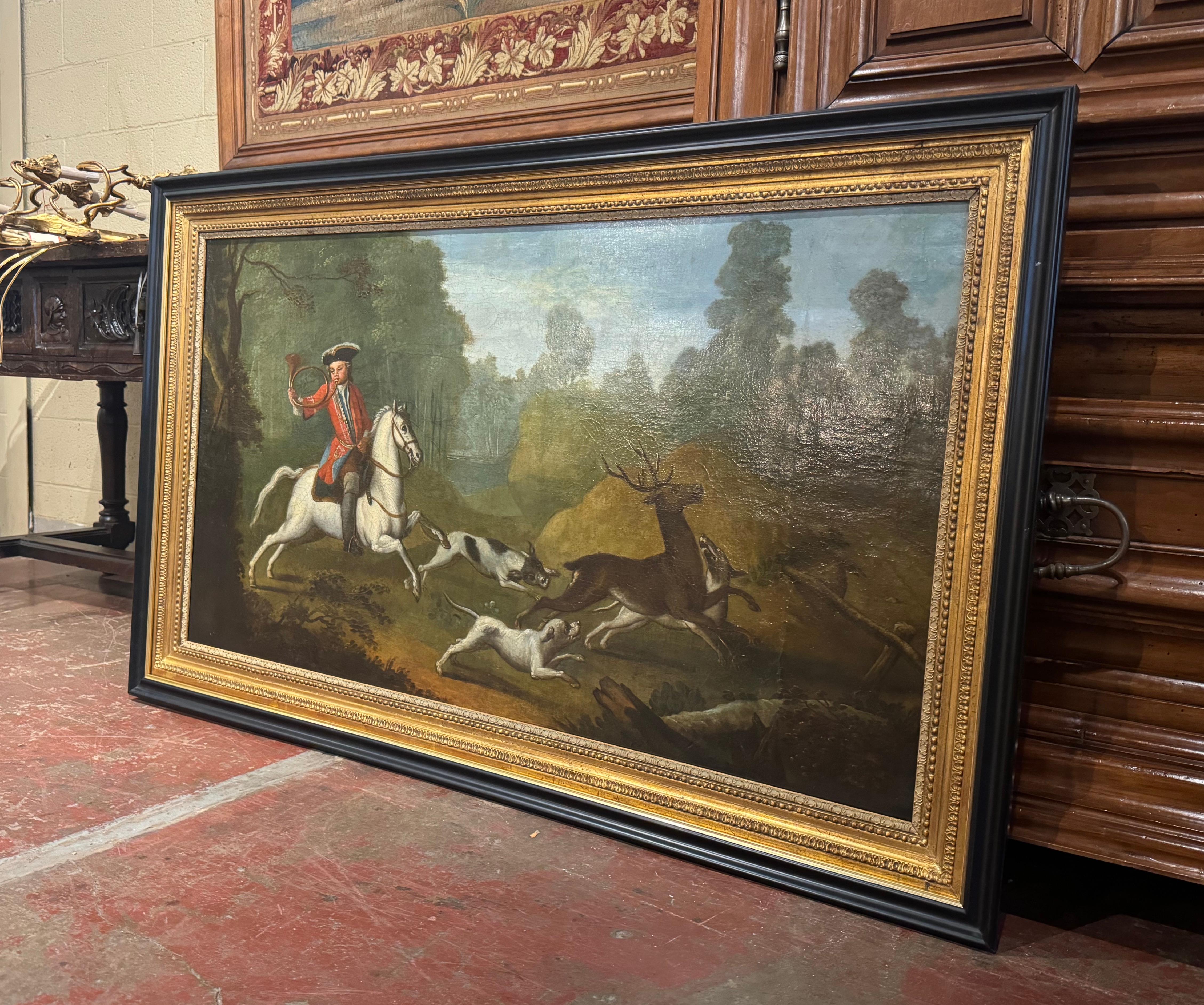 Decorate a study or office with this elegant antique painting. Hand painted in France circa 1780, and set in the original carved gilt wood frame (with blackened trim for later addition), the large painting on canvas vividly portrays an exhilarating
