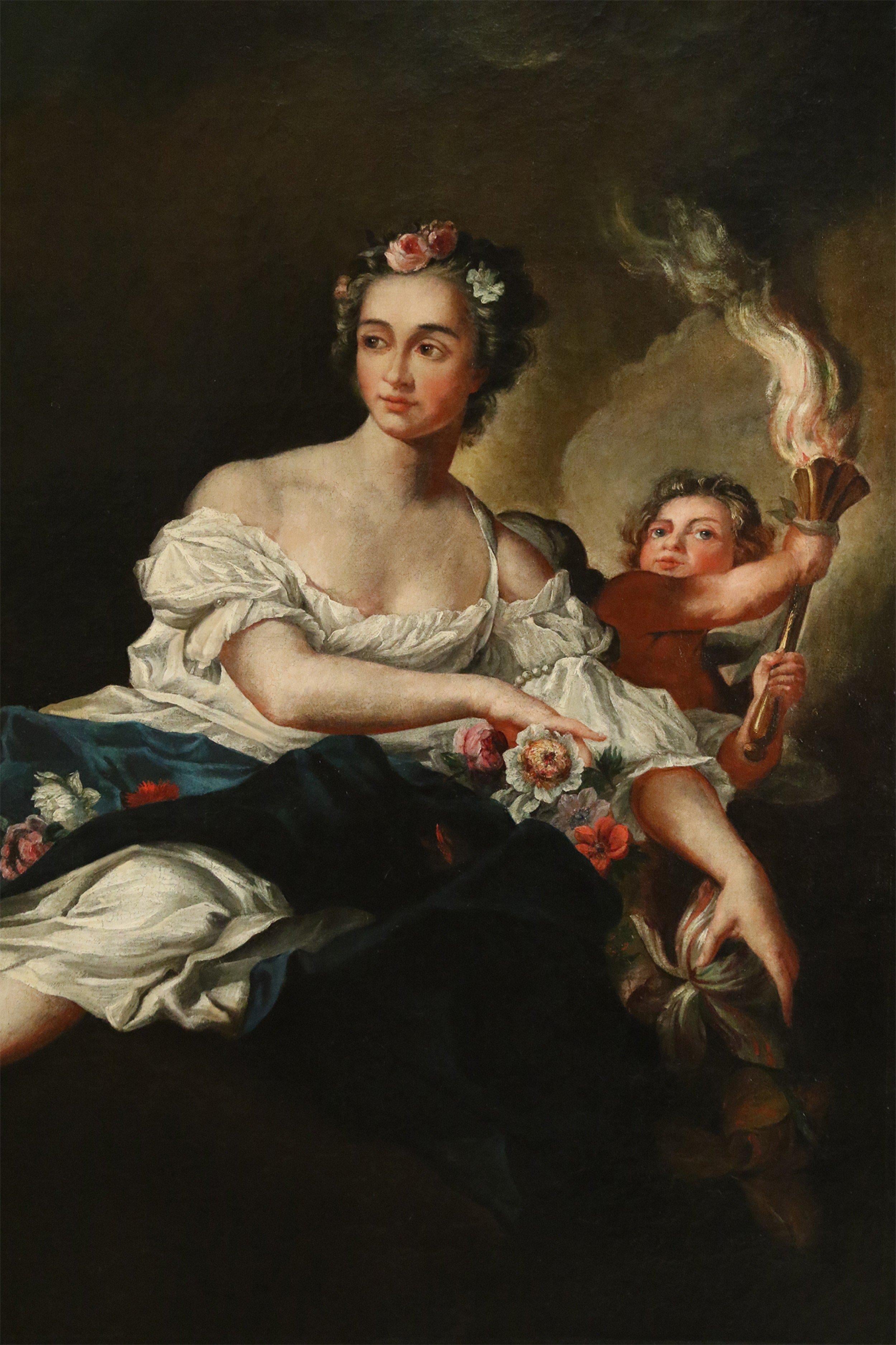 Grande peinture à l'huile française (18e-19e siècle) représentant une femme tenant des fleurs et un enfant portant une torche dans un cadre rectangulaire orné de bois doré sculpté.